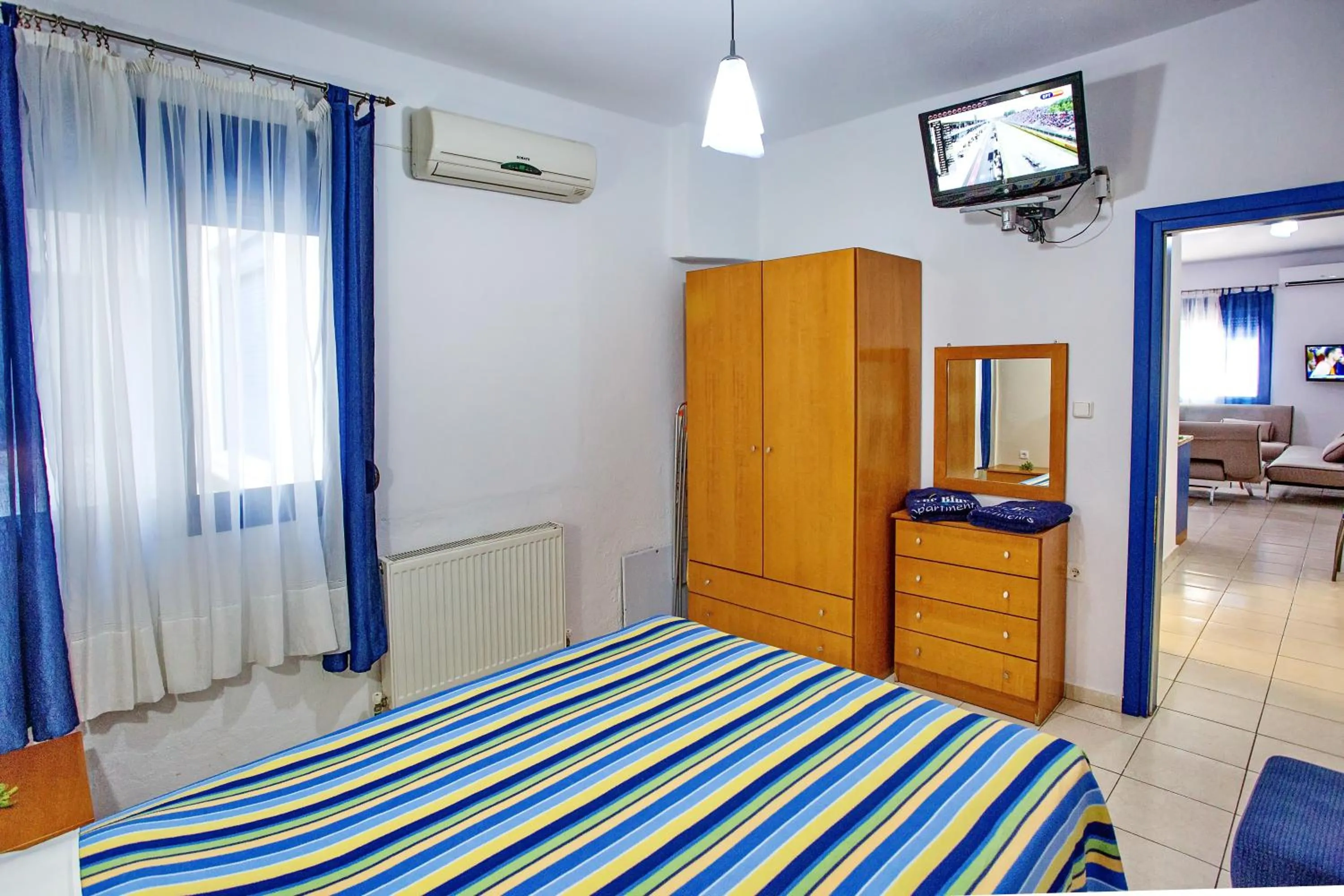 Bed in The Blue Beach Apartments