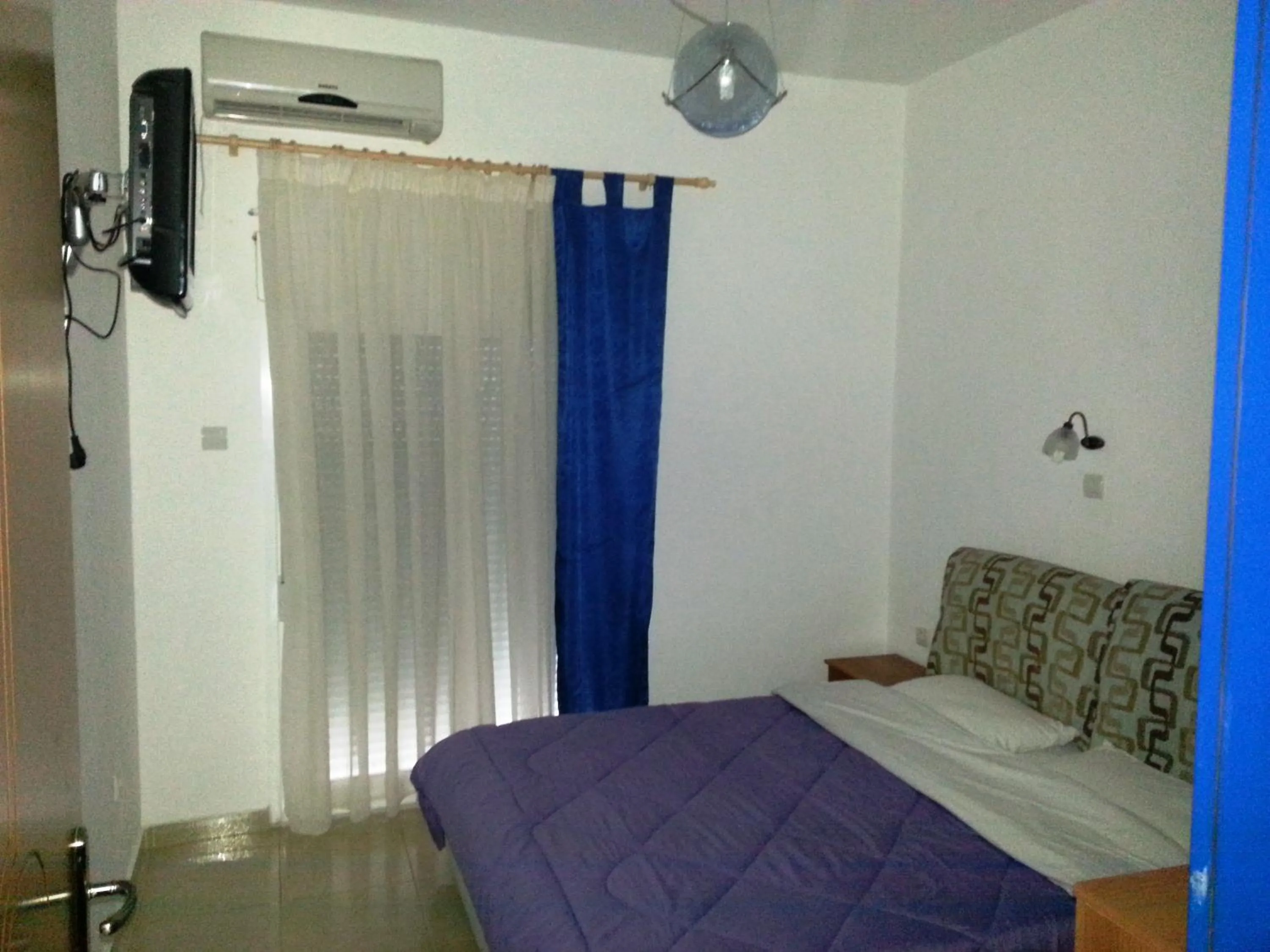 Bed in The Blue Beach Apartments