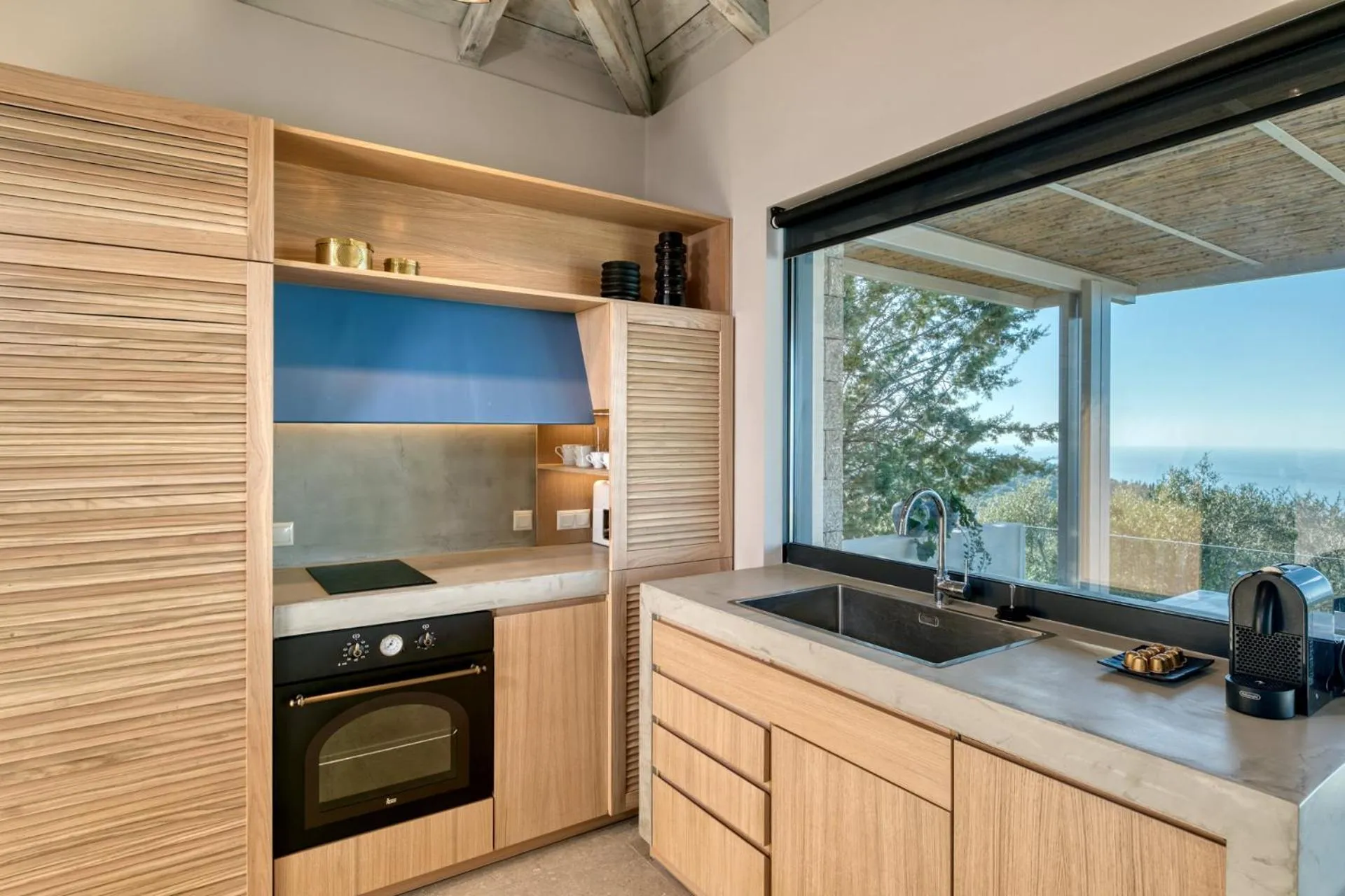 Kitchen or kitchenette in Artblue Villas