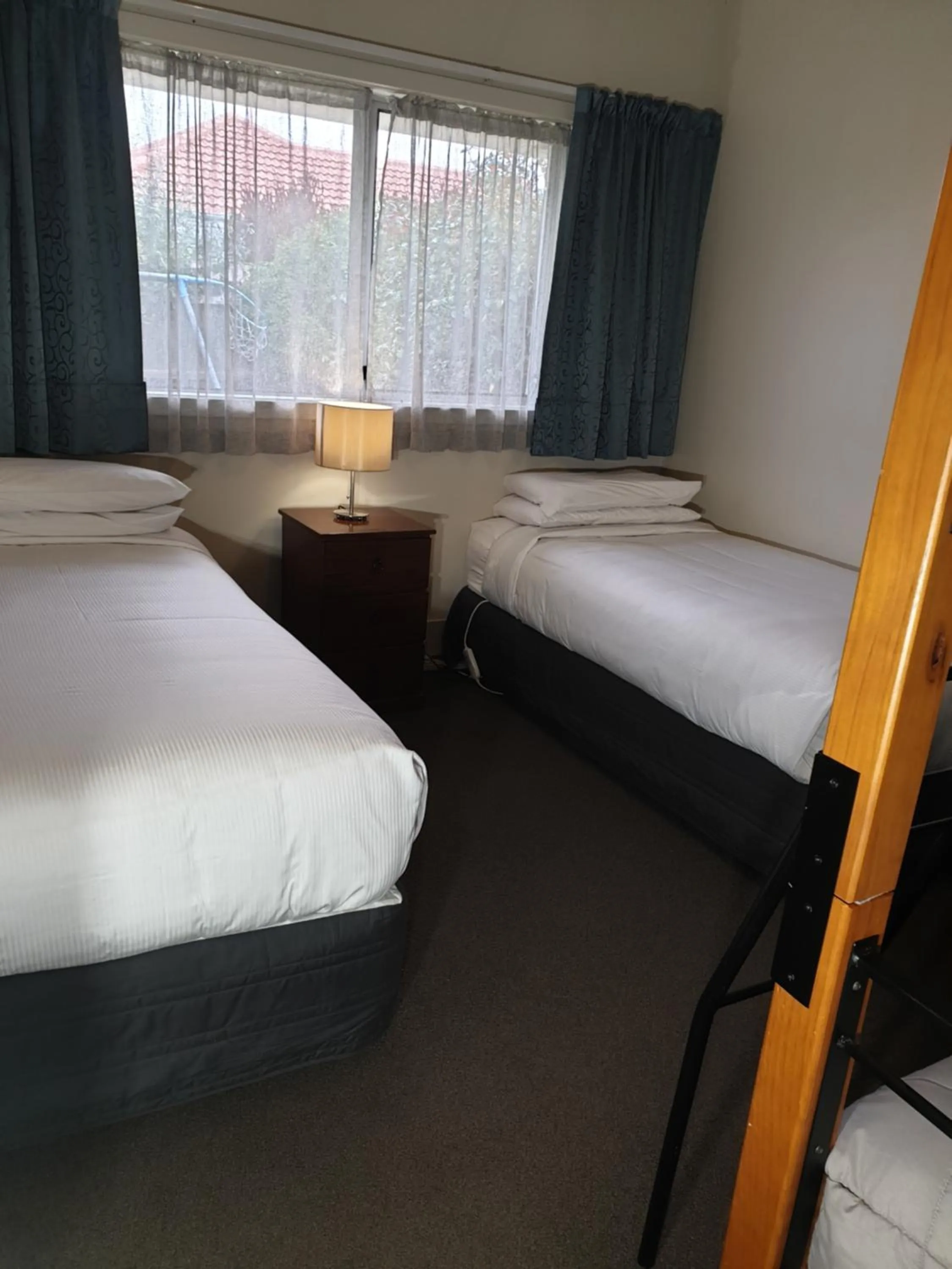 Bed in Northcote Motor Lodge