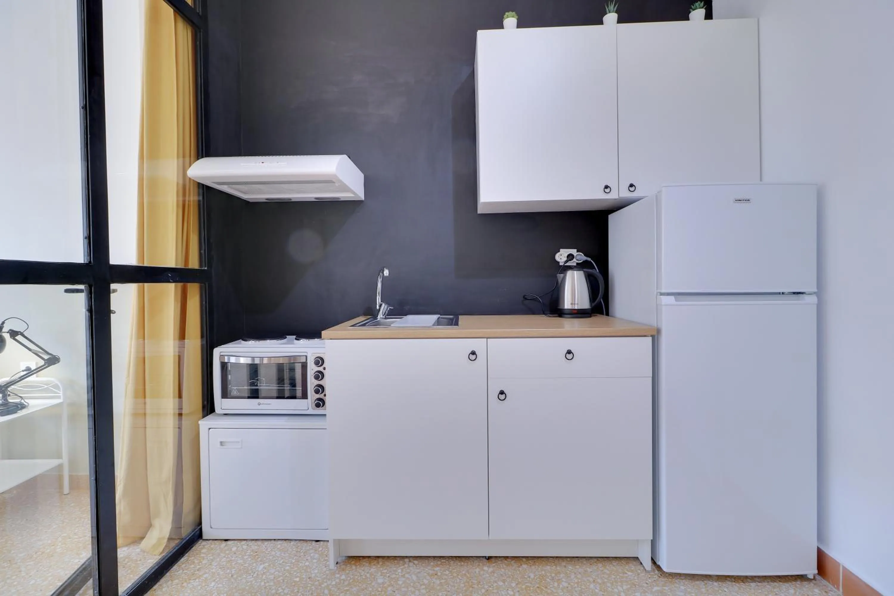 Kitchen or kitchenette in athens.apartotel.1