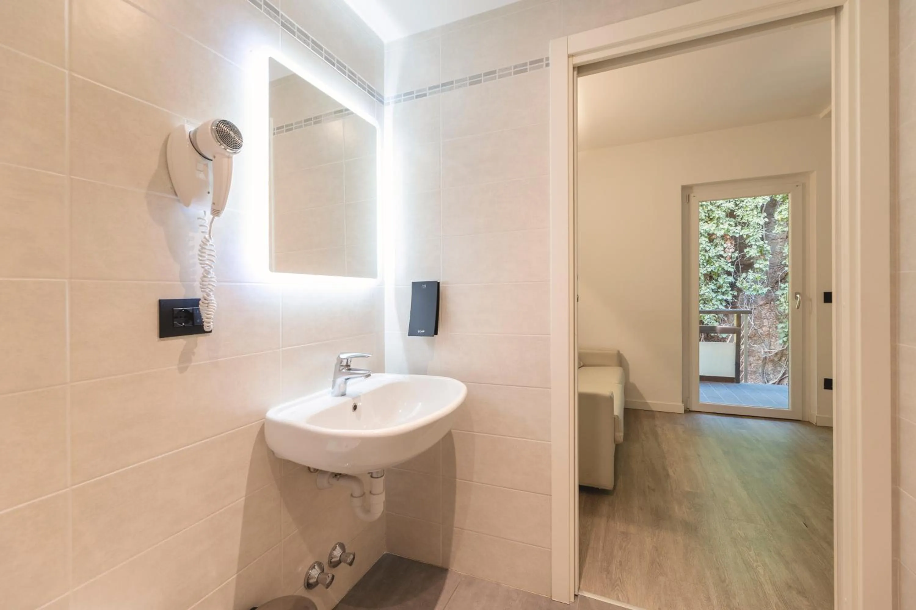 Bathroom in Hi Hotels Trento - Wellness & Spa Adults Only