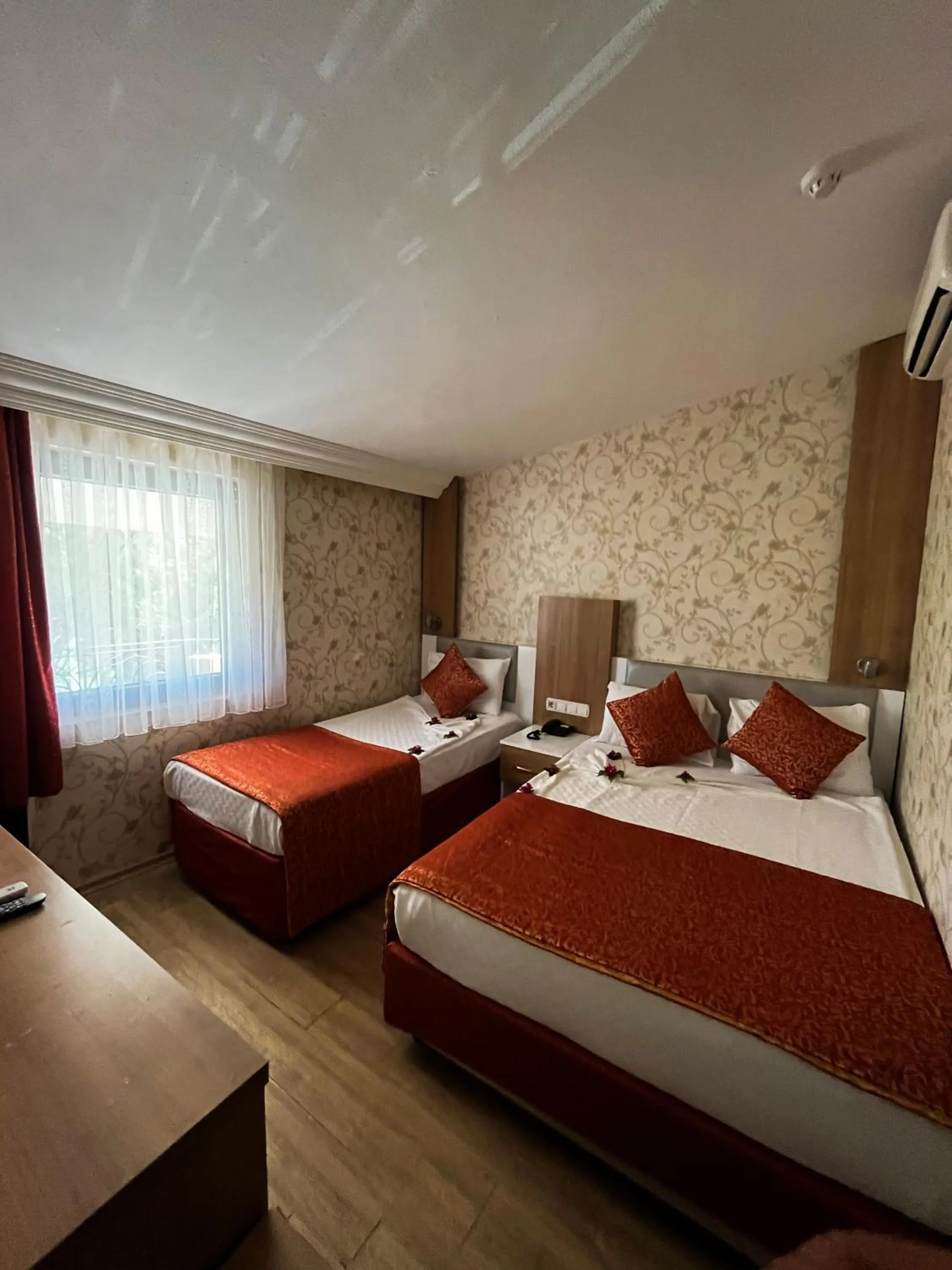 Bed in Aleria Belport Beach Hotel