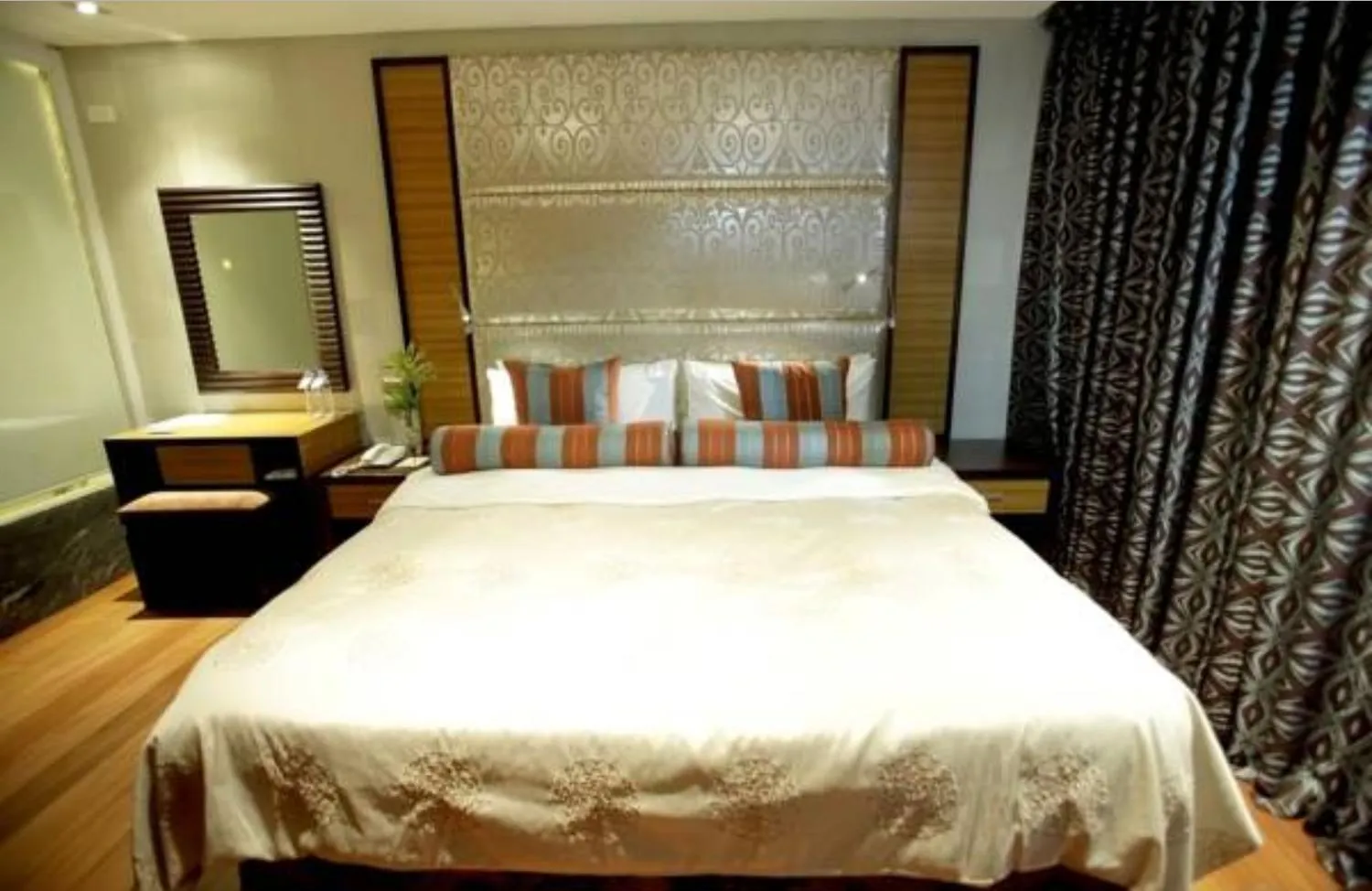 Bed in The Royal Mandaya Hotel