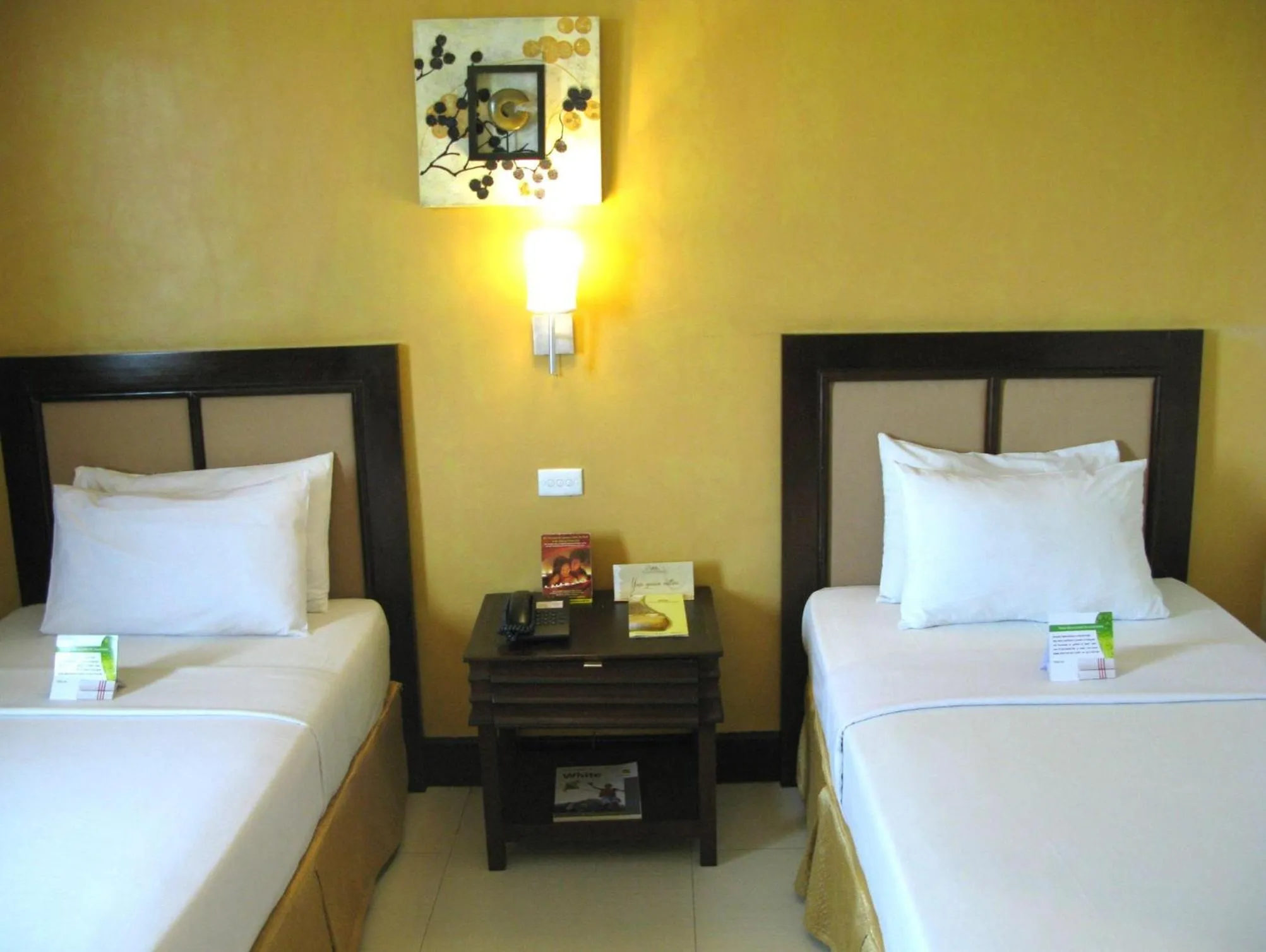 Bed in The Royal Mandaya Hotel