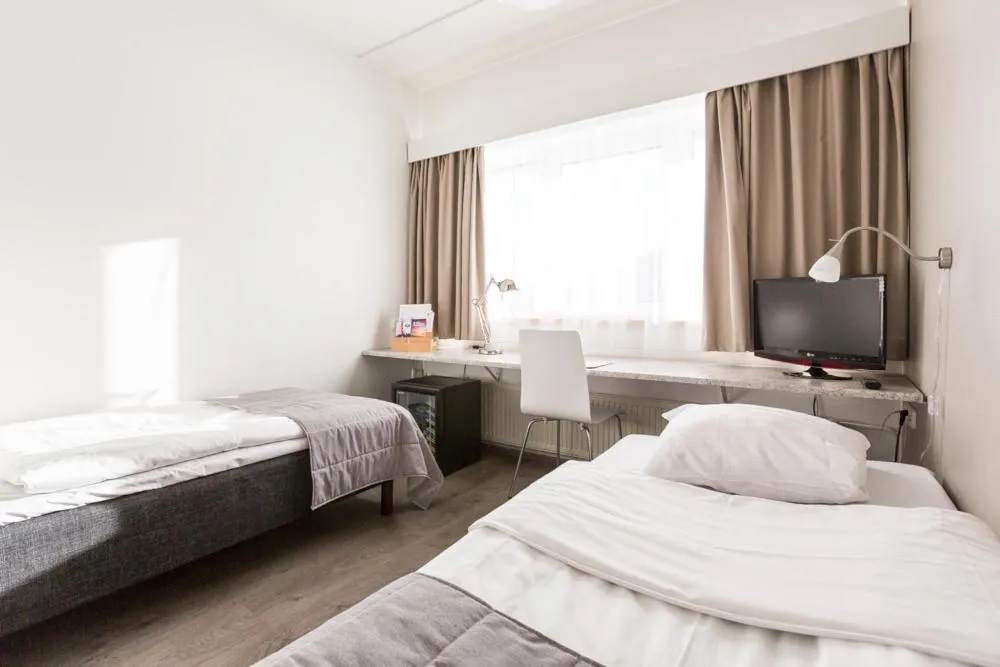 Photo of the whole room, Bed in Finlandia Hotel Alba