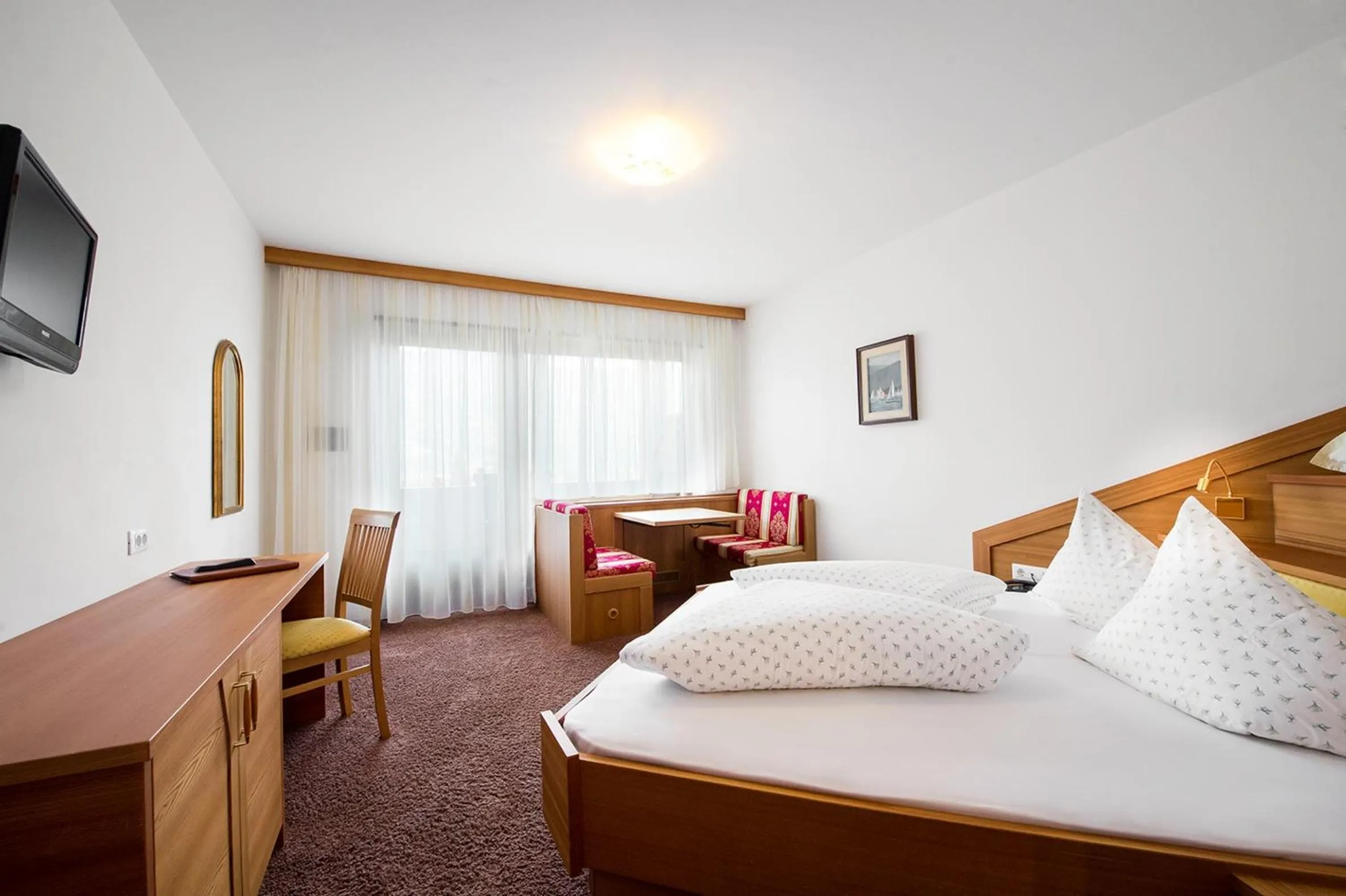 Bedroom in Hotel Paradies