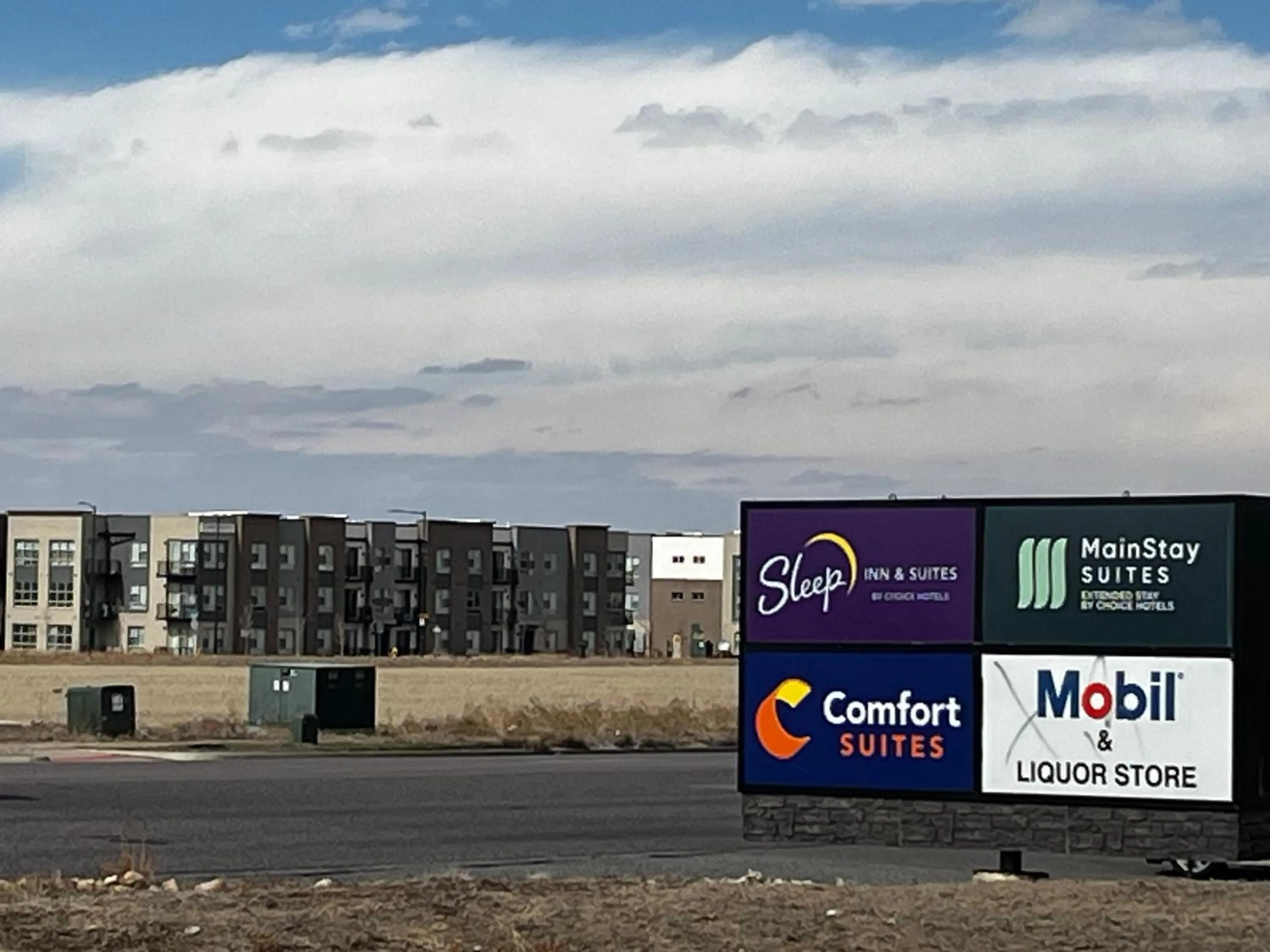 Property logo or sign in Comfort Suites Denver International Airport