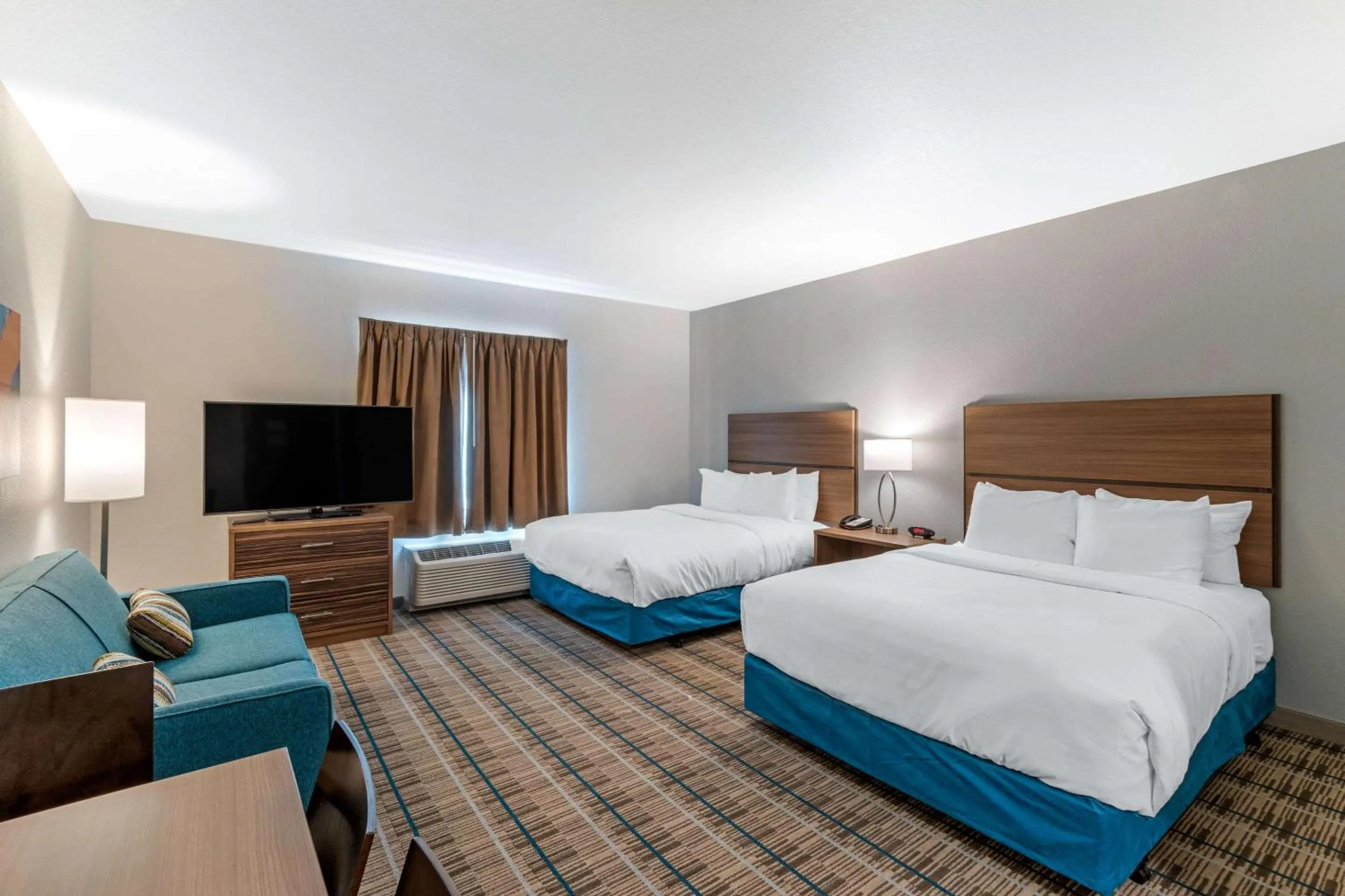 Bedroom, Bed in MainStay Suites Denver International Airport