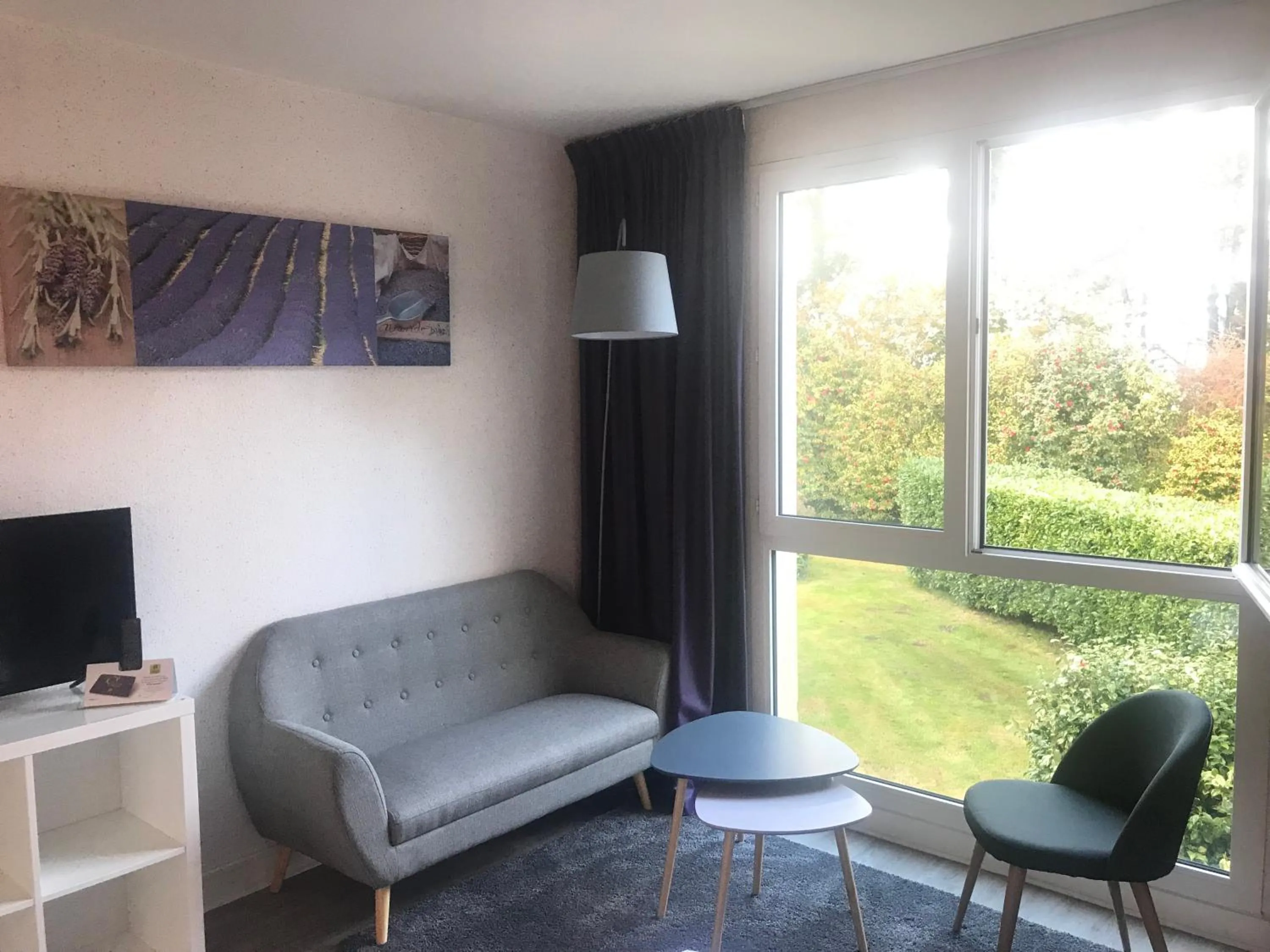 Living room in Logis Latitude Ouest Hôtel Restaurant & Spa