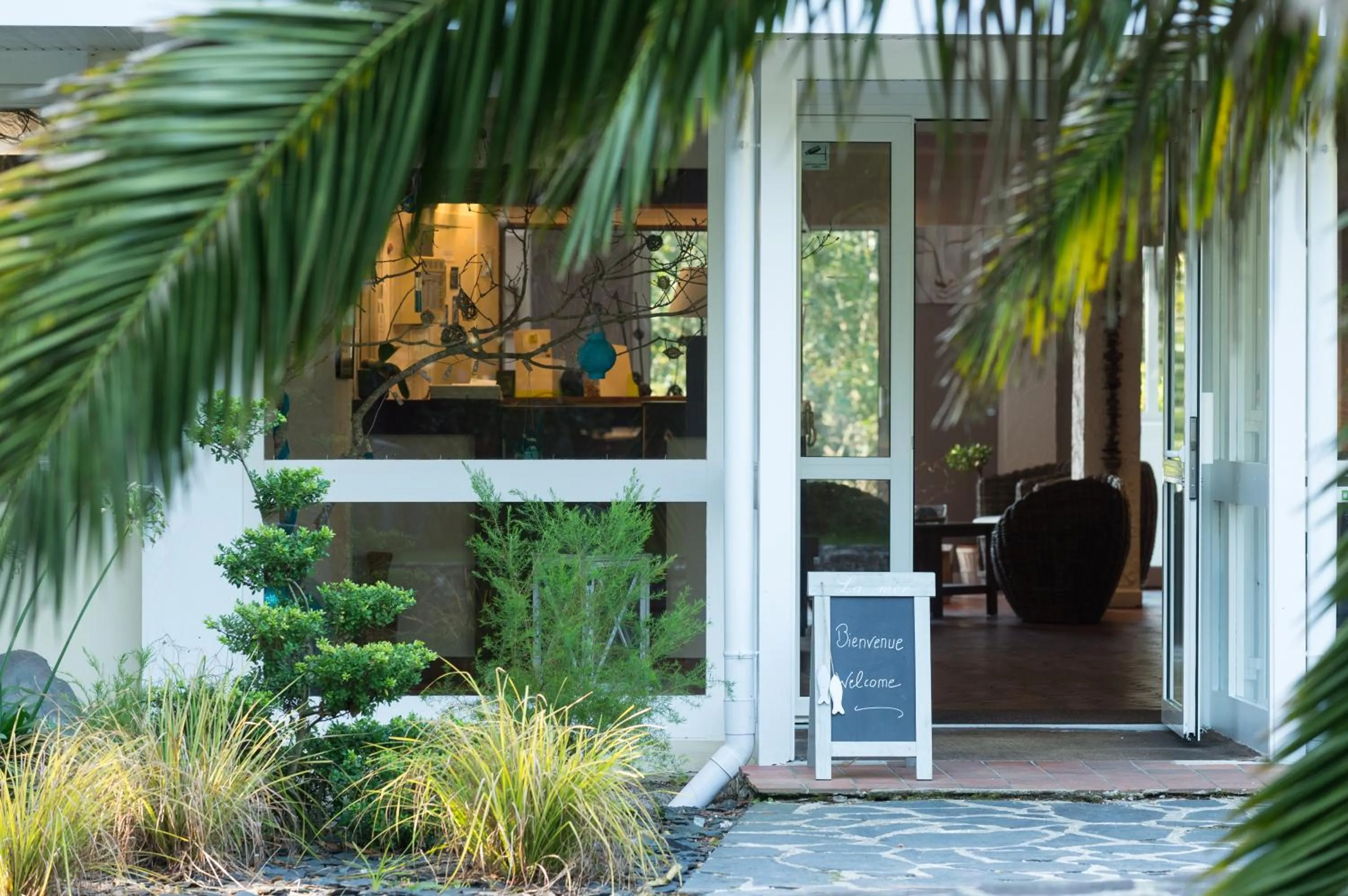 Property building in Logis Latitude Ouest Hôtel Restaurant & Spa