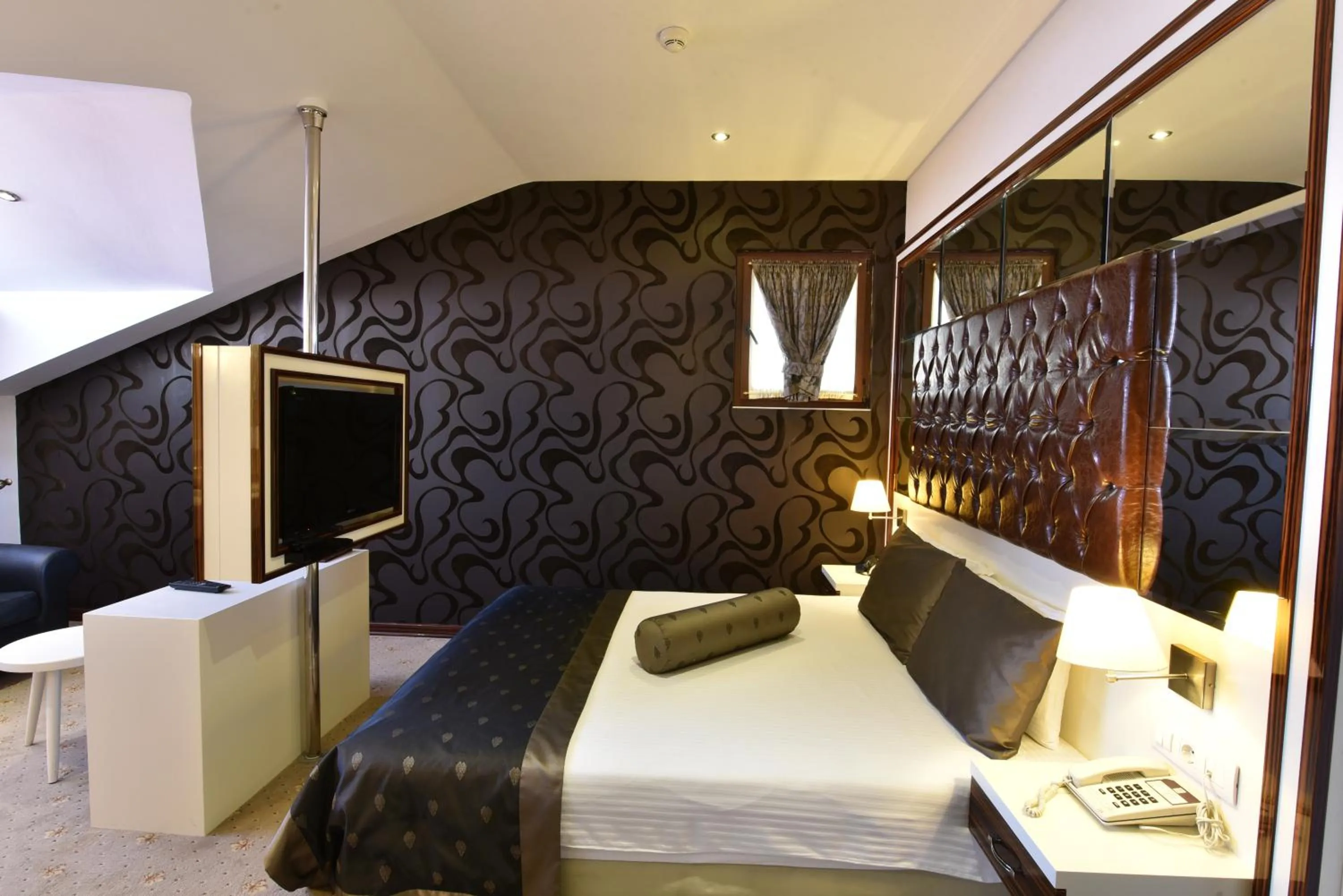 Bed in Blueberry Boutique Hotel