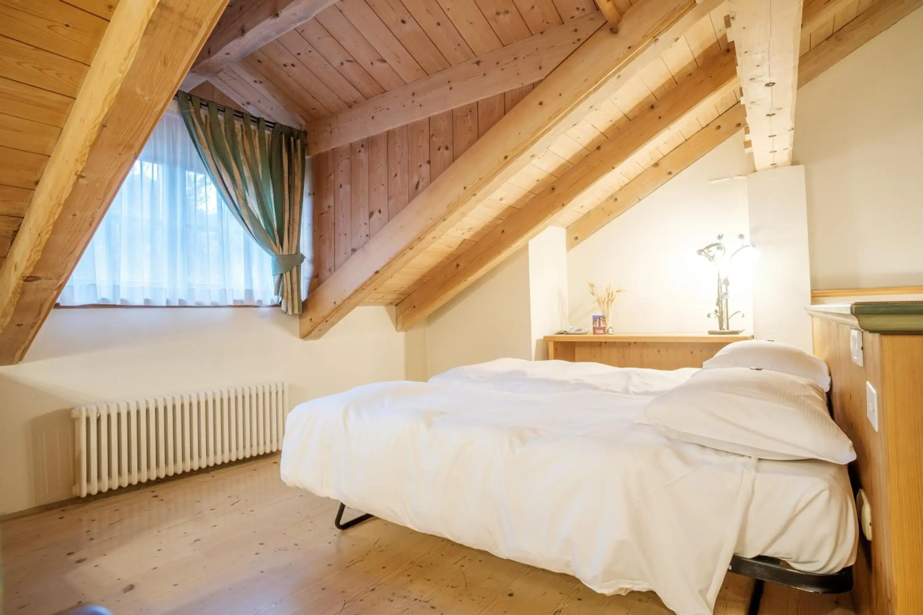 Quadruple Room in Casa Moresc Quadruple Room in Casa Moresc