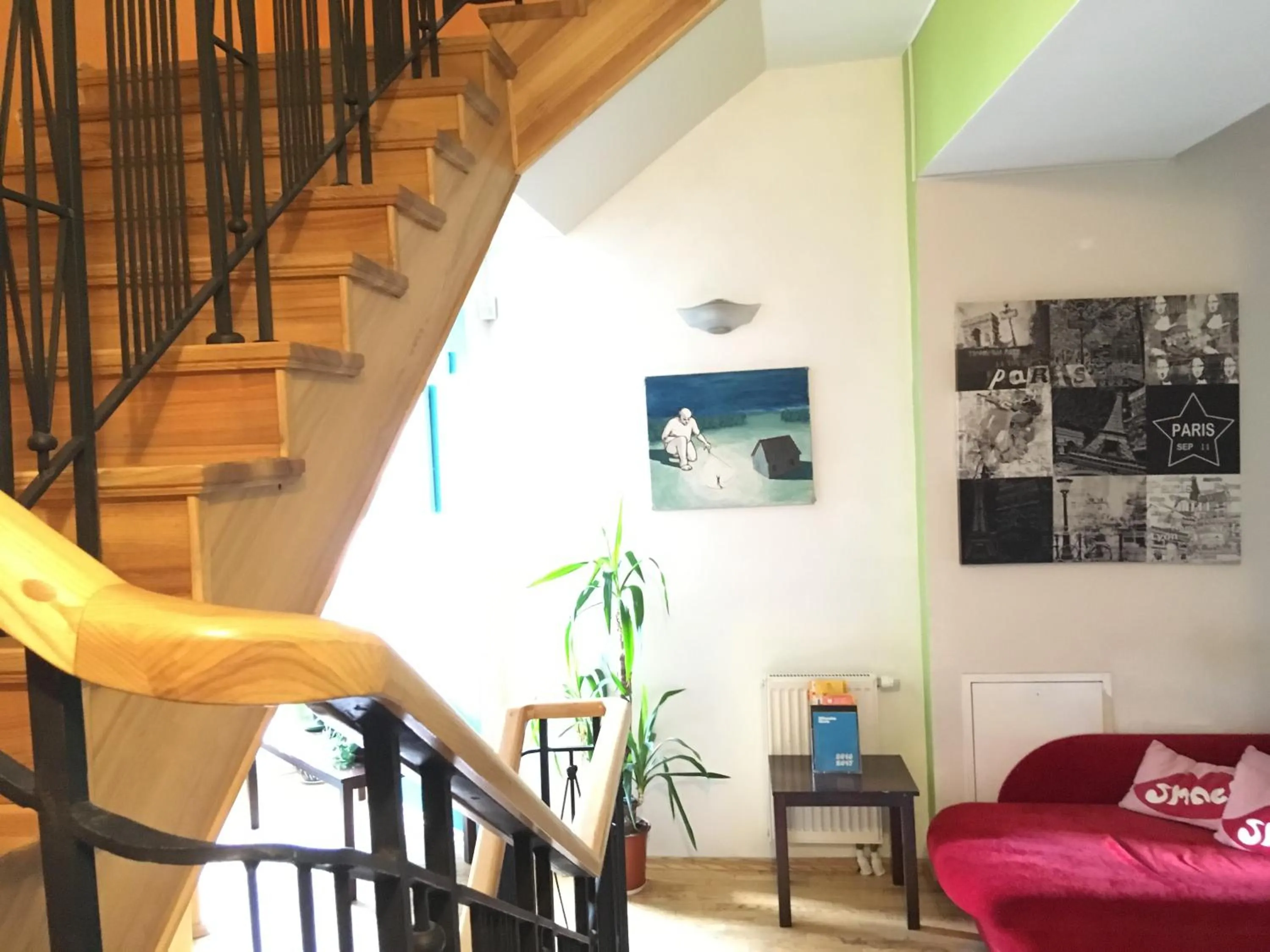 Communal lounge/ TV room in Pogo Hostel