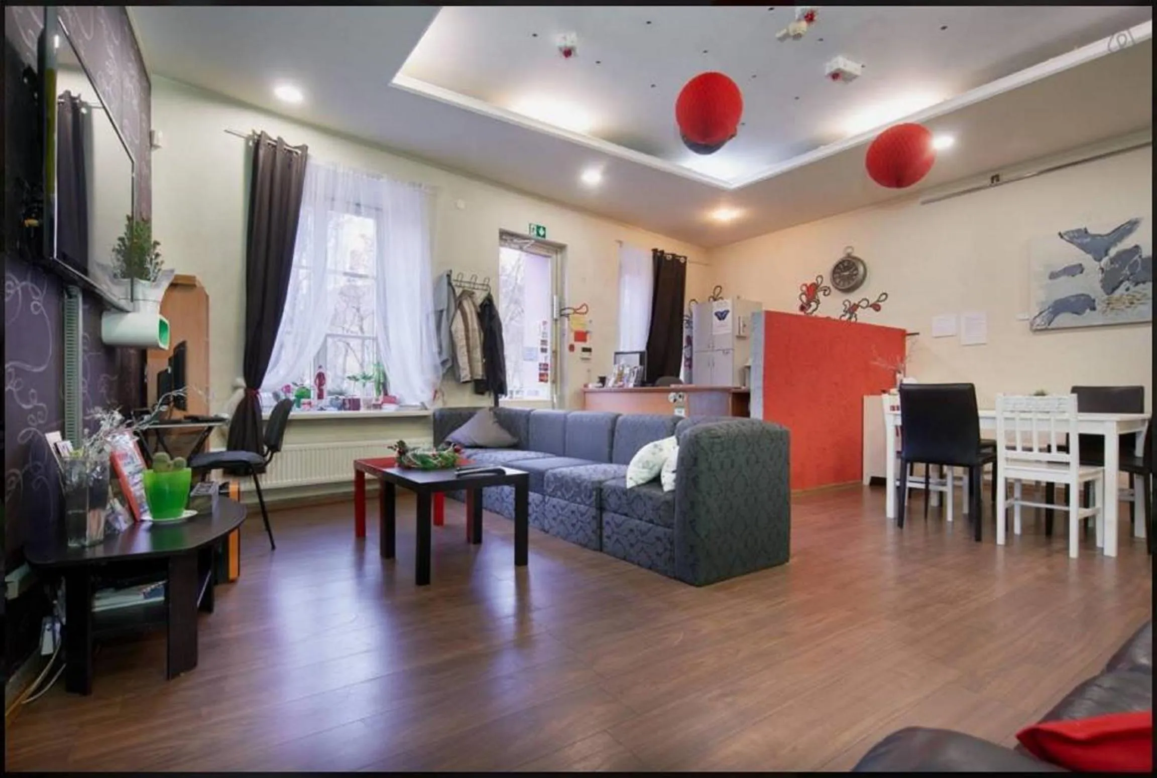 Communal lounge/ TV room in Pogo Hostel