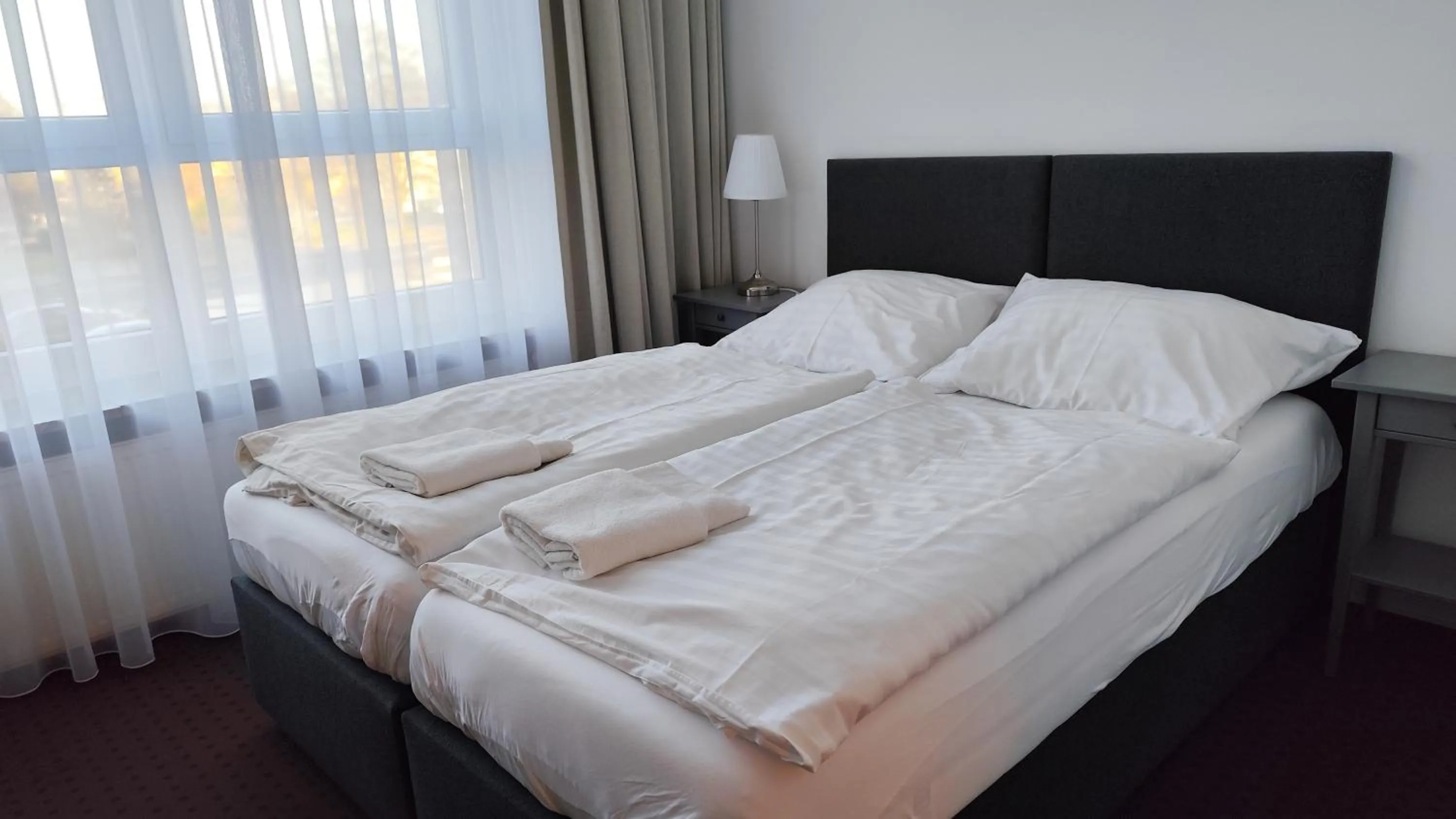 Bed in Mini Hotel Akord