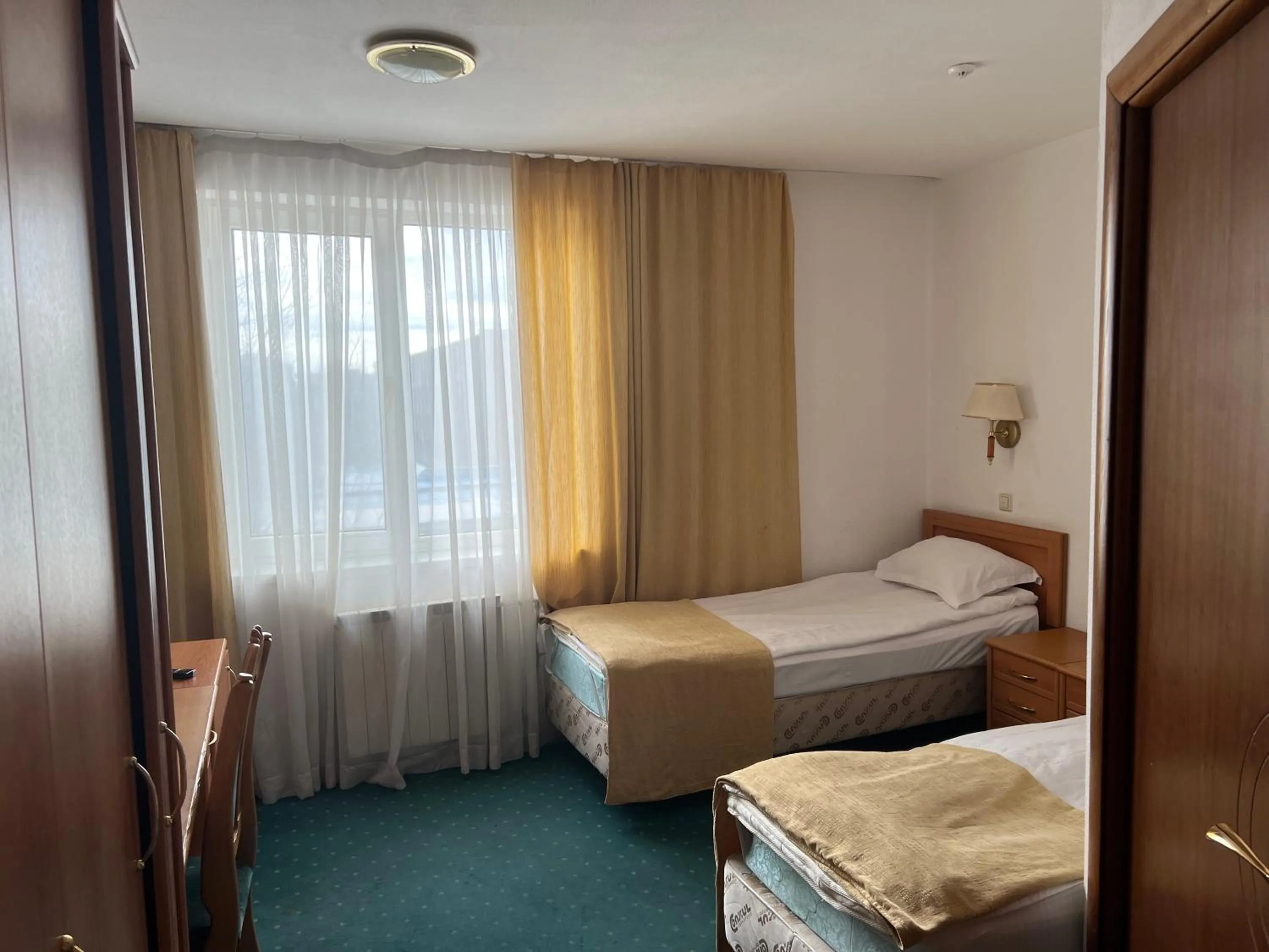 Bedroom in Green Hotel