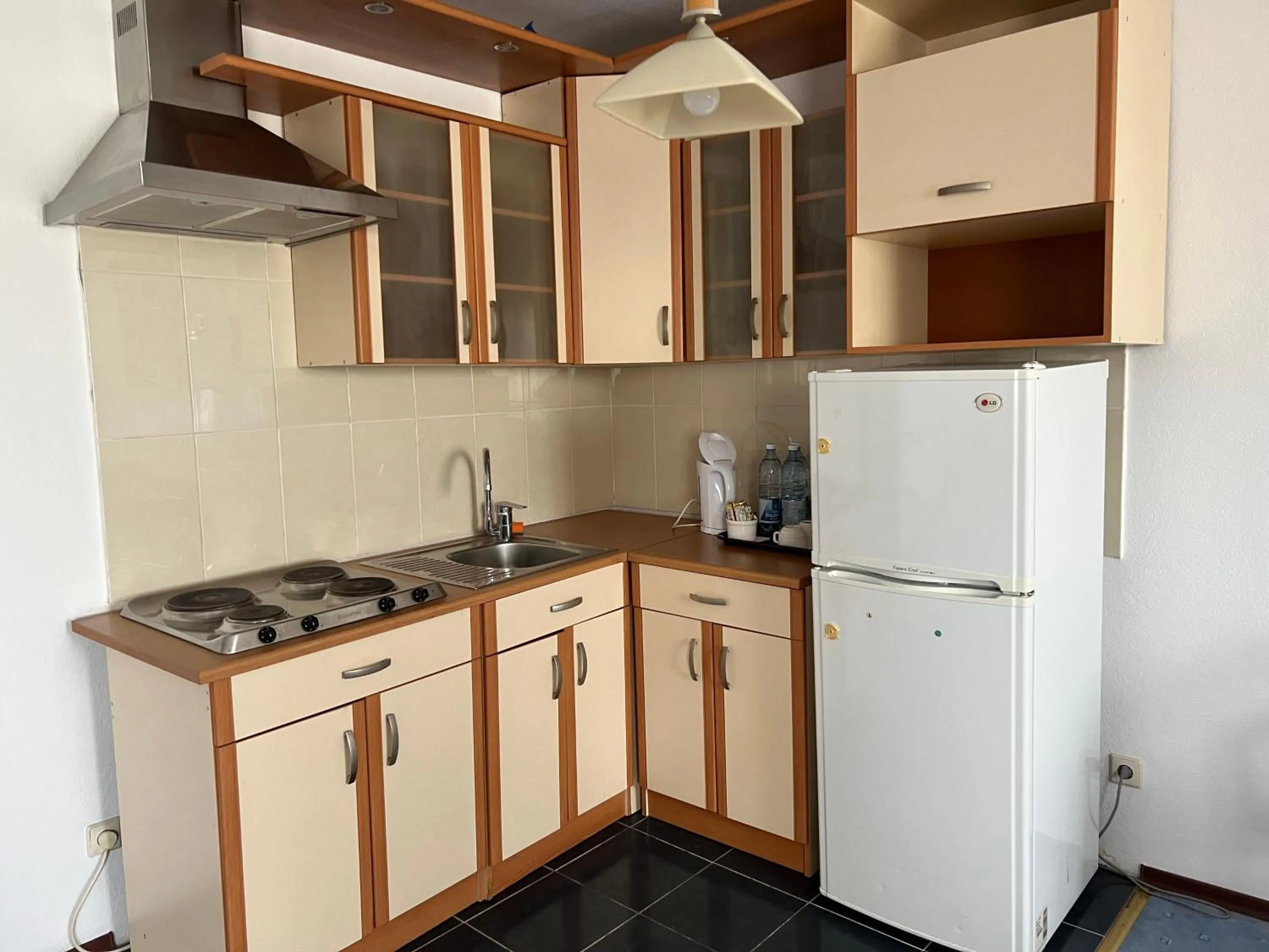 Kitchen or kitchenette in Green Hotel
