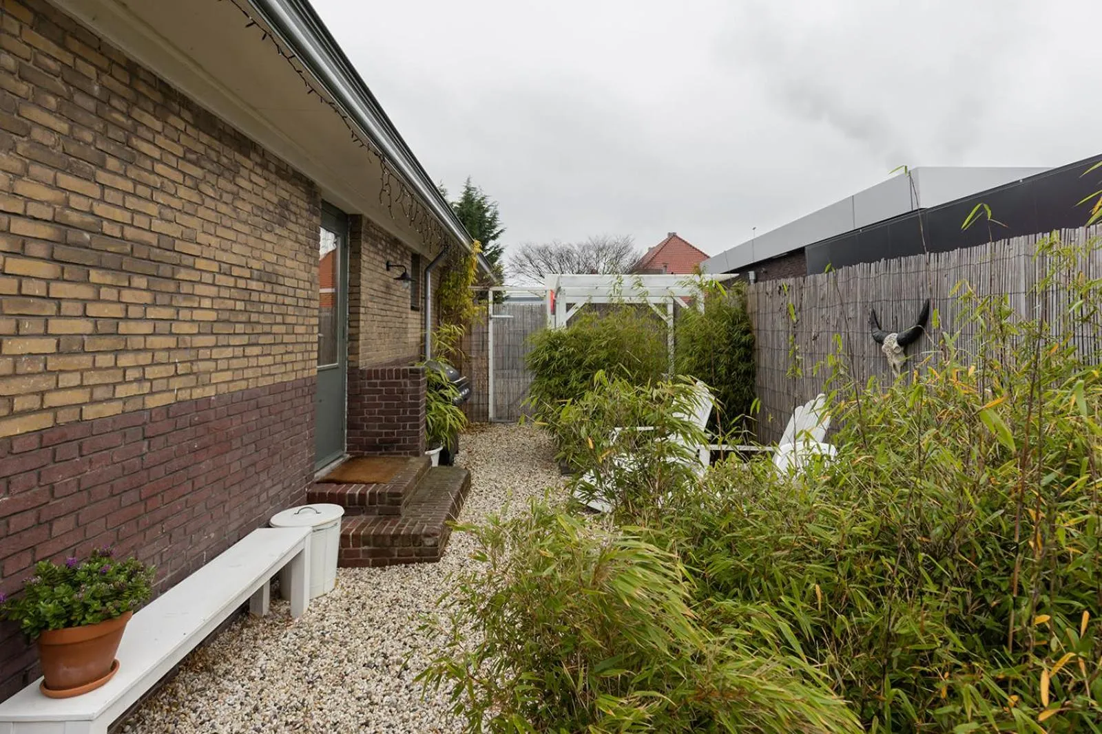 Garden in De oude slaght- luxe suite met buitensauna