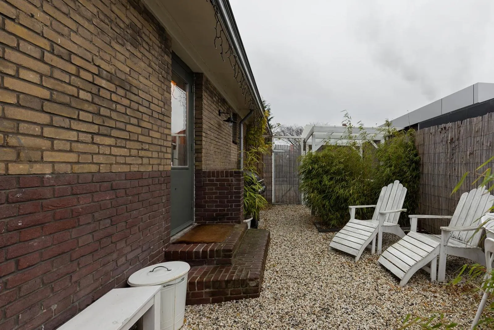 Garden in De oude slaght- luxe suite met buitensauna