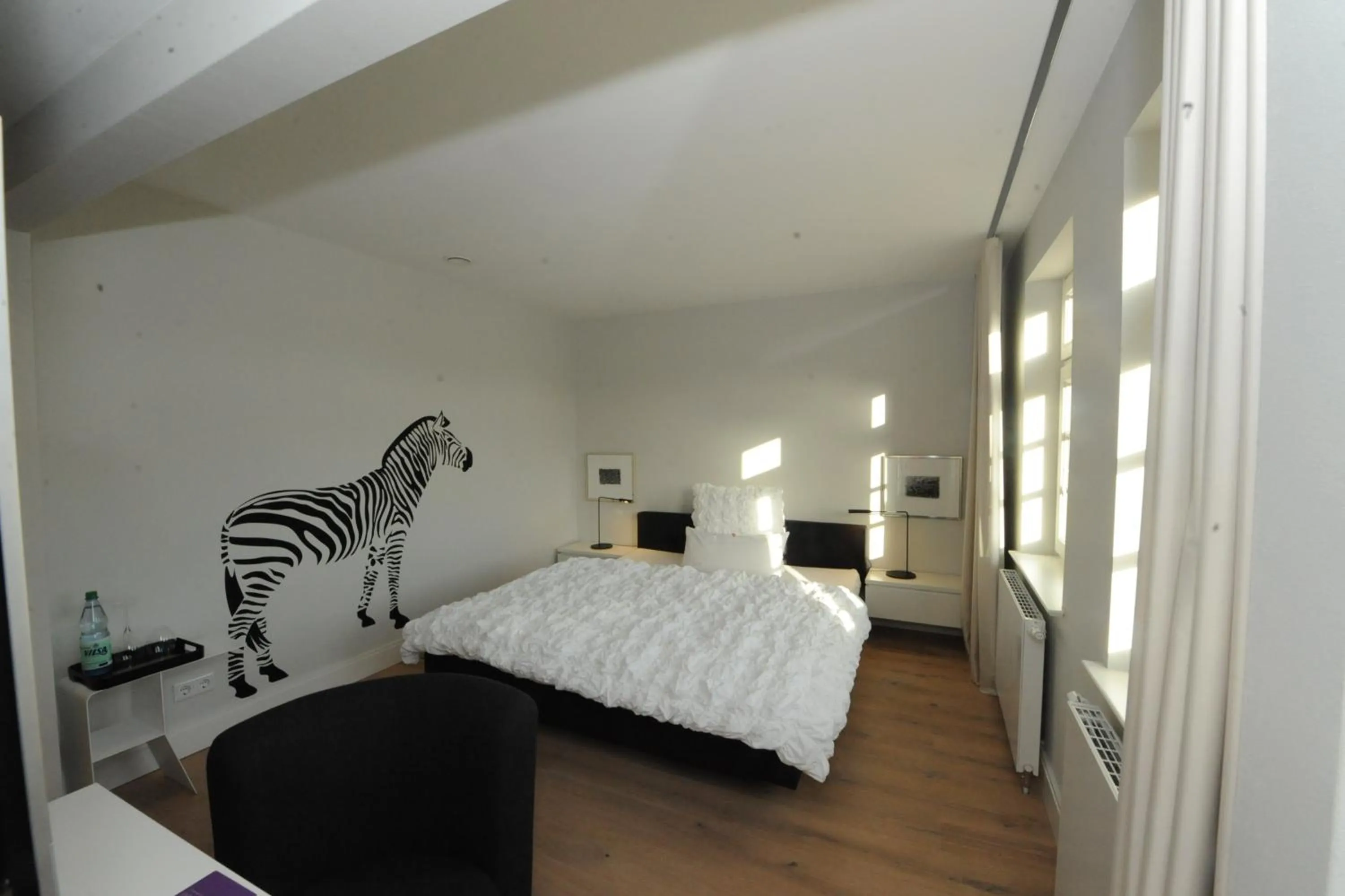 Photo of the whole room, Bed in Designhotel Rosenbohm