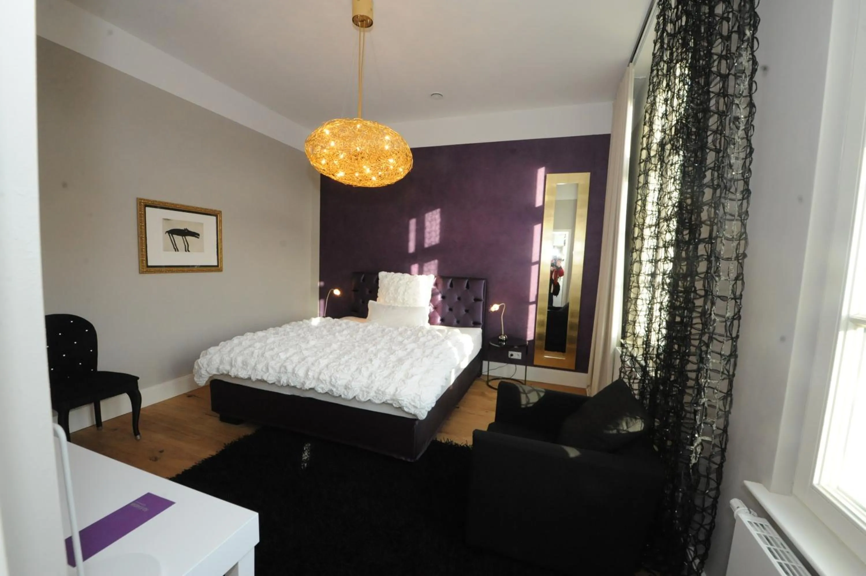 Photo of the whole room, Bed in Designhotel Rosenbohm