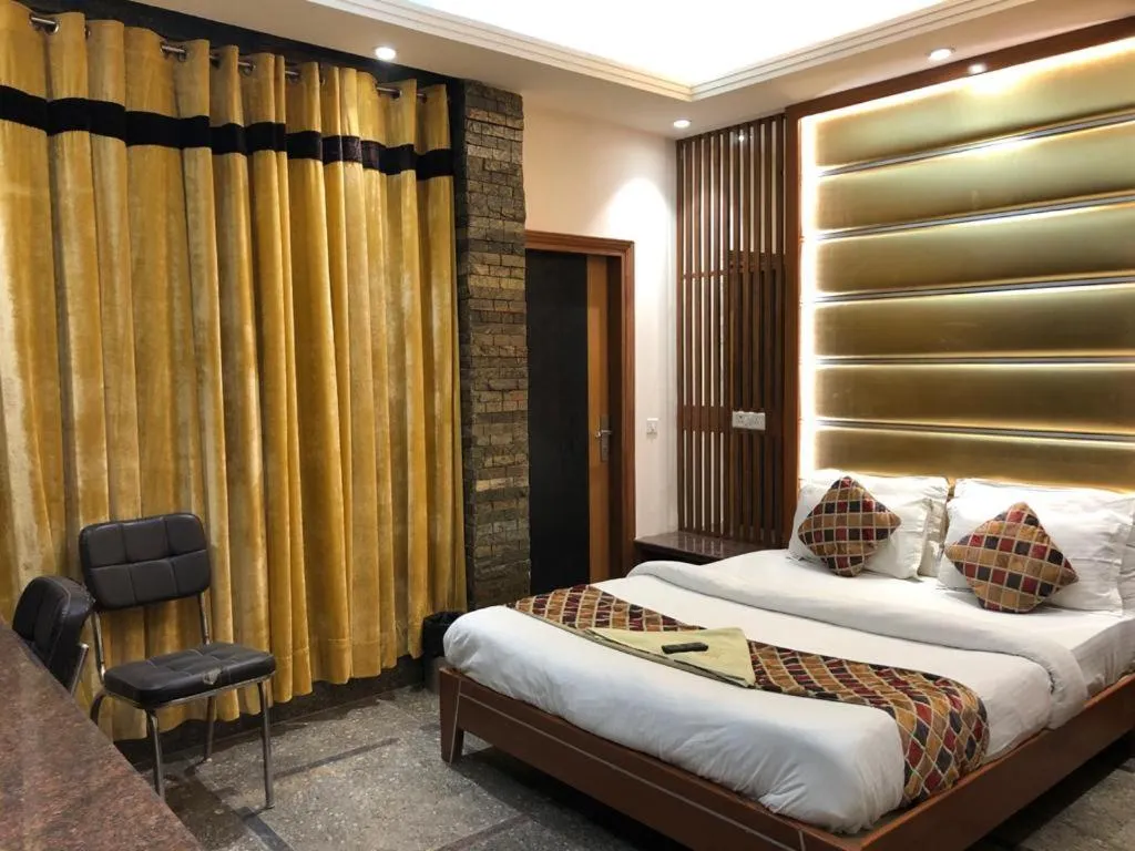 Photo of the whole room, Bed in Stay @ 203