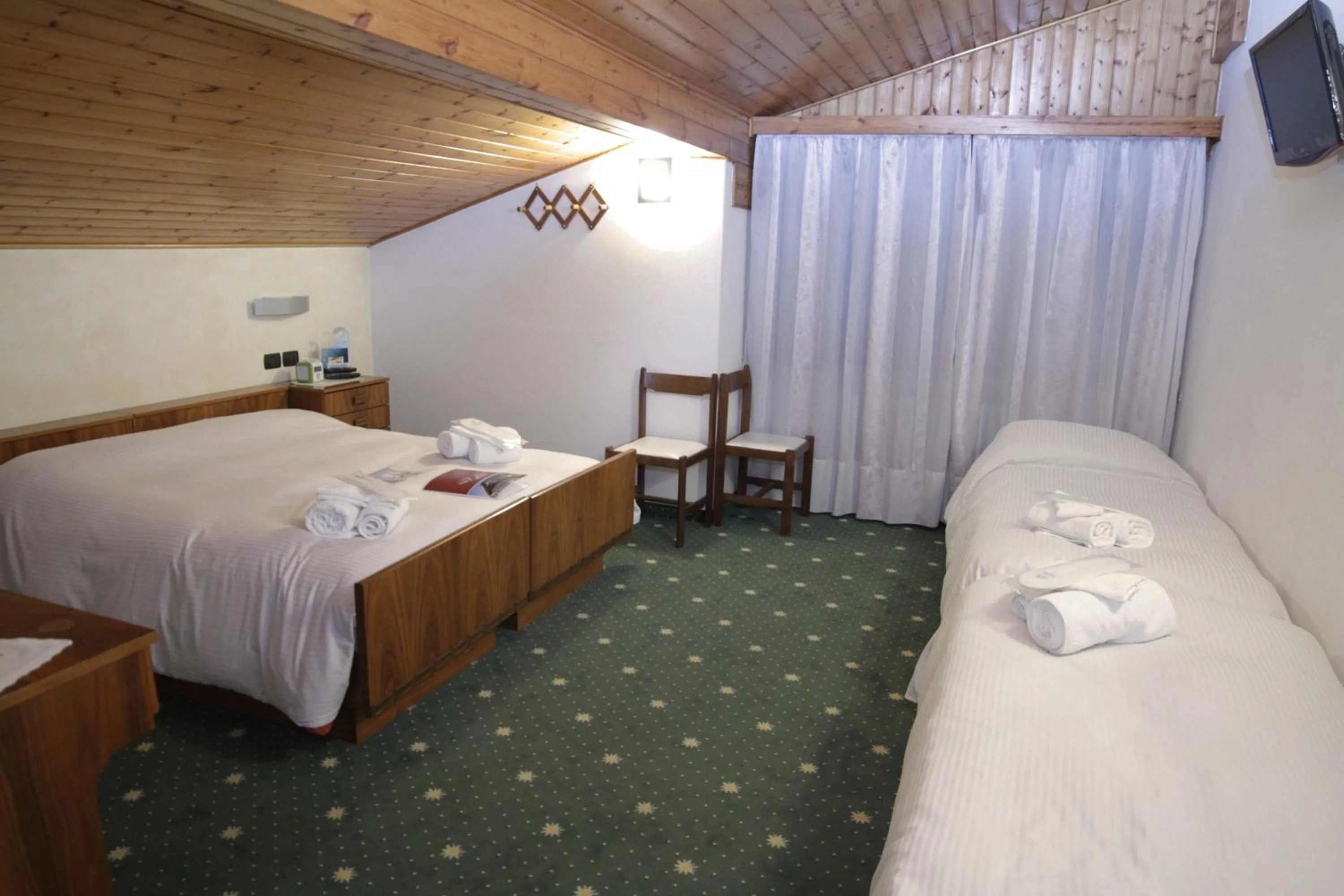 Photo of the whole room, Bed in Hotel Stella Alpina