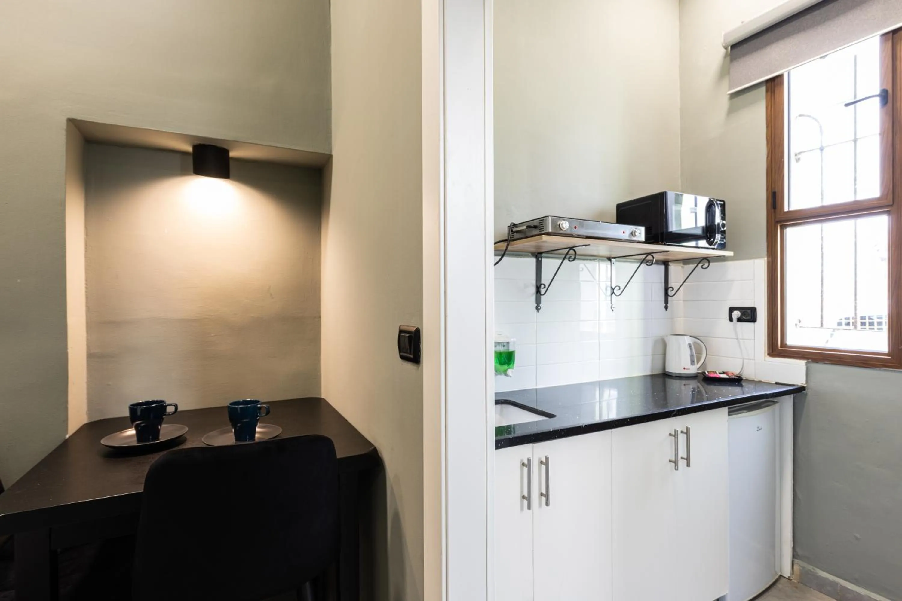 Kitchen or kitchenette in Residence Suites BY RAPHAEL HOTELS