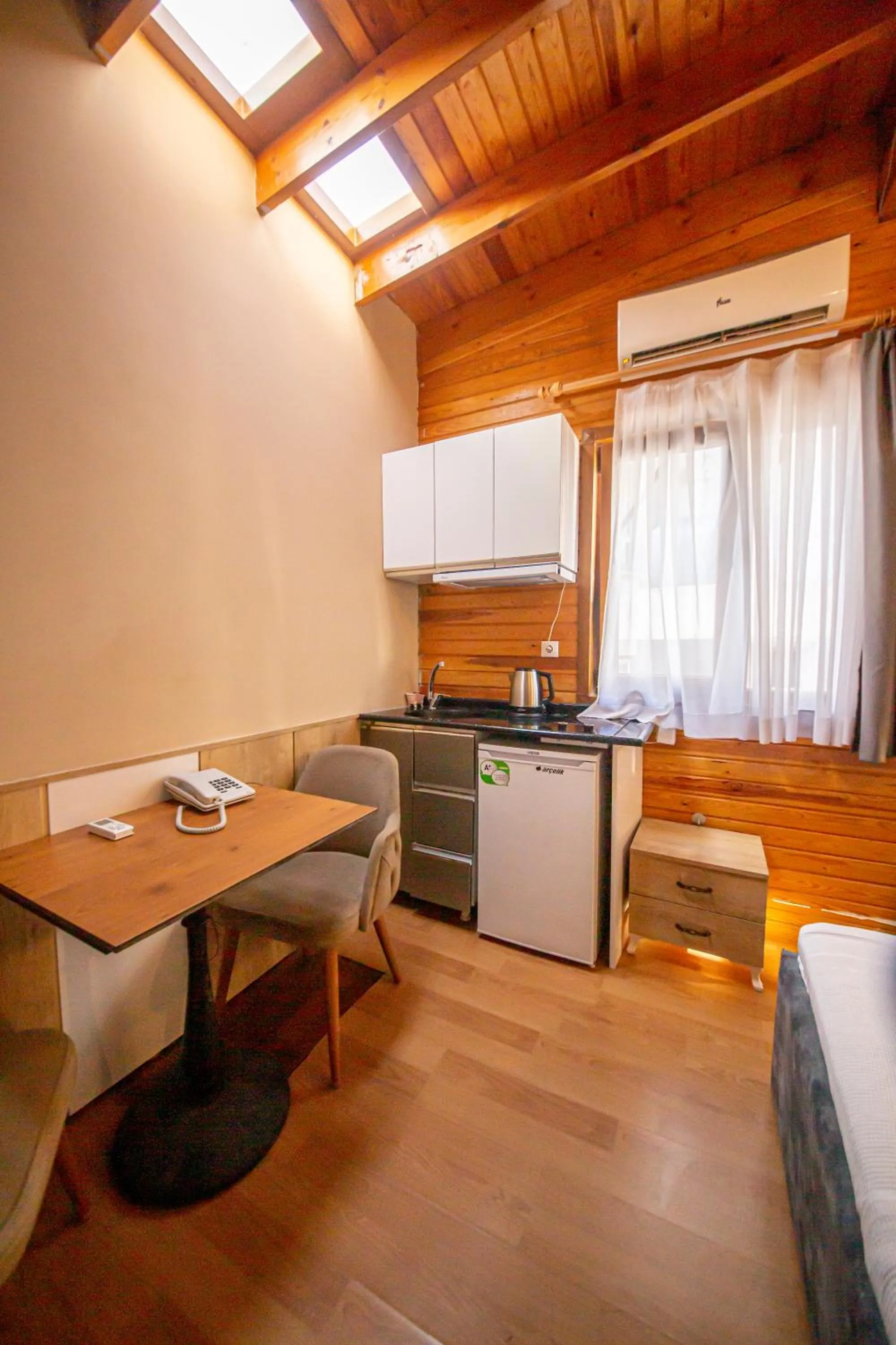 Kitchen or kitchenette in Royal Garden Suite and Hotel