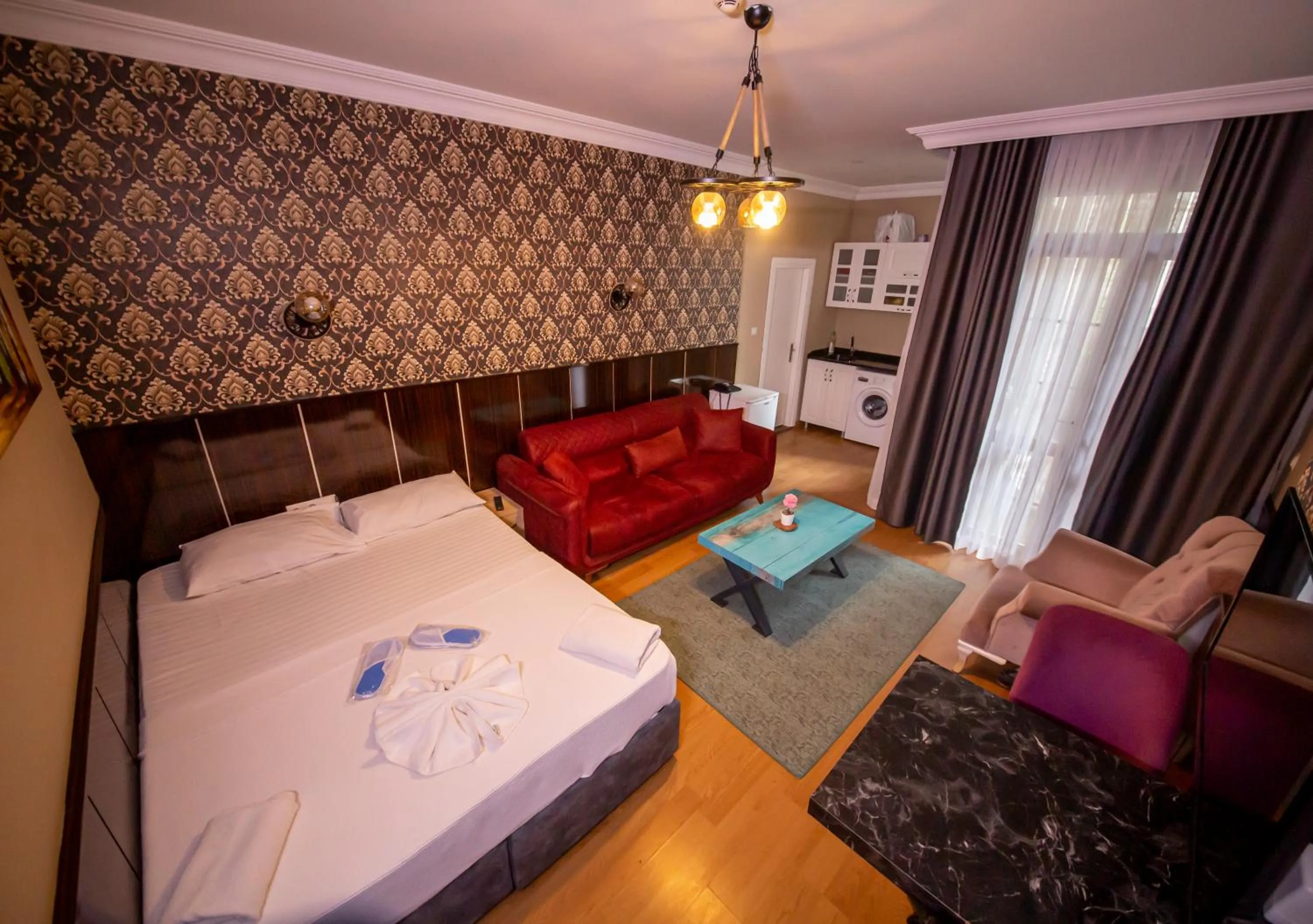 Bed in Royal Garden Suite and Hotel