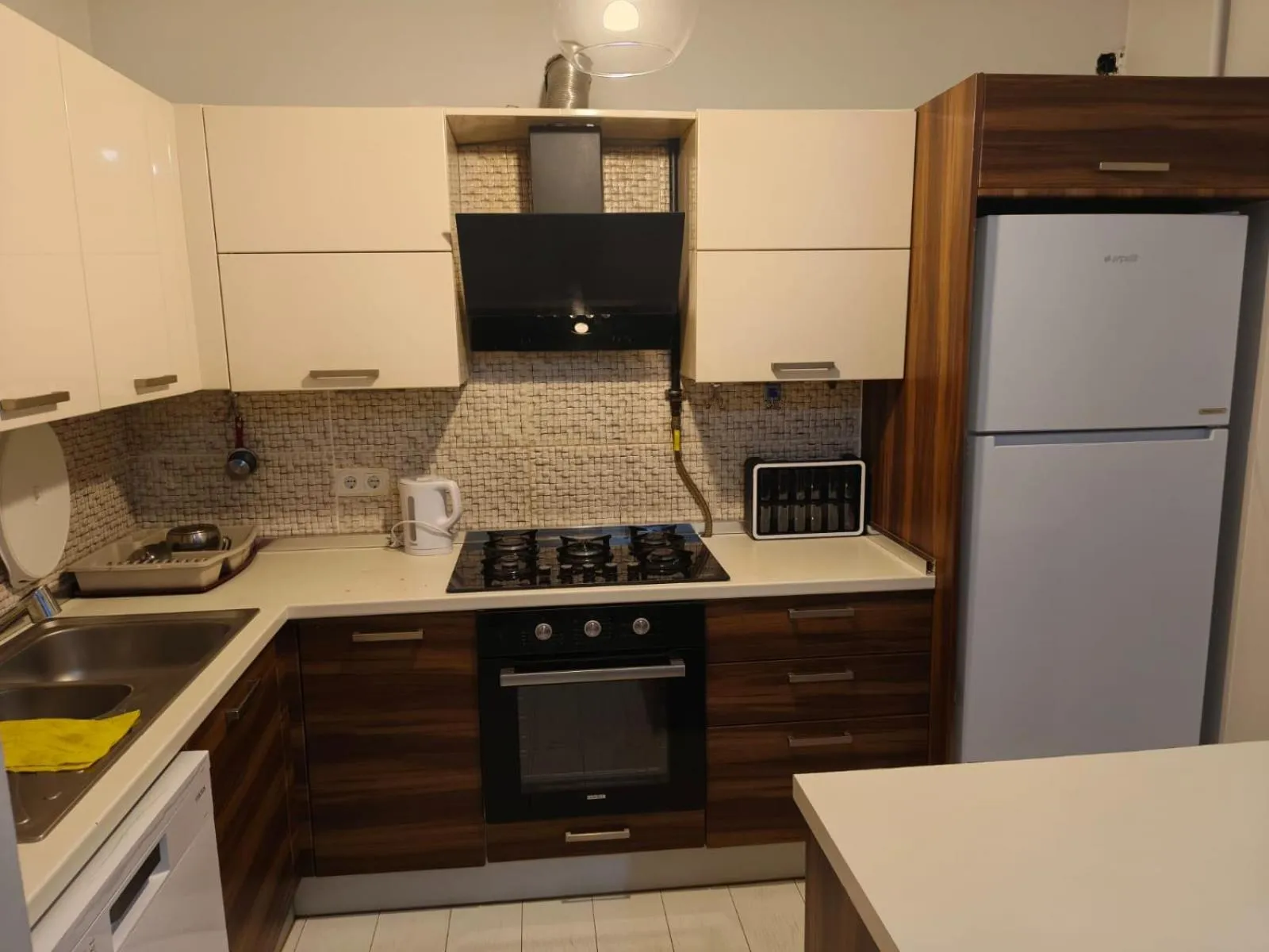 Kitchen or kitchenette in Royal Garden Suite and Hotel