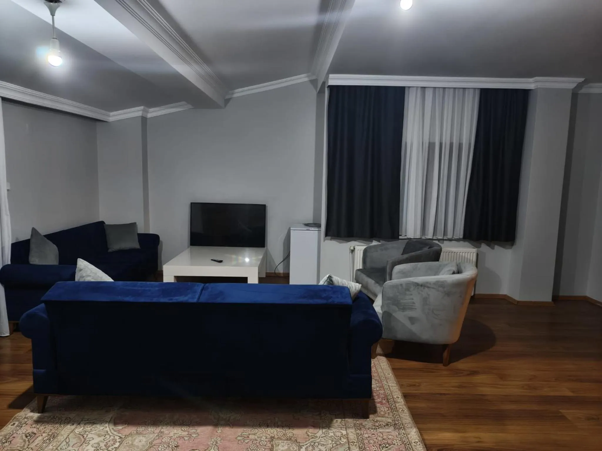 Living room in Royal Garden Suite and Hotel