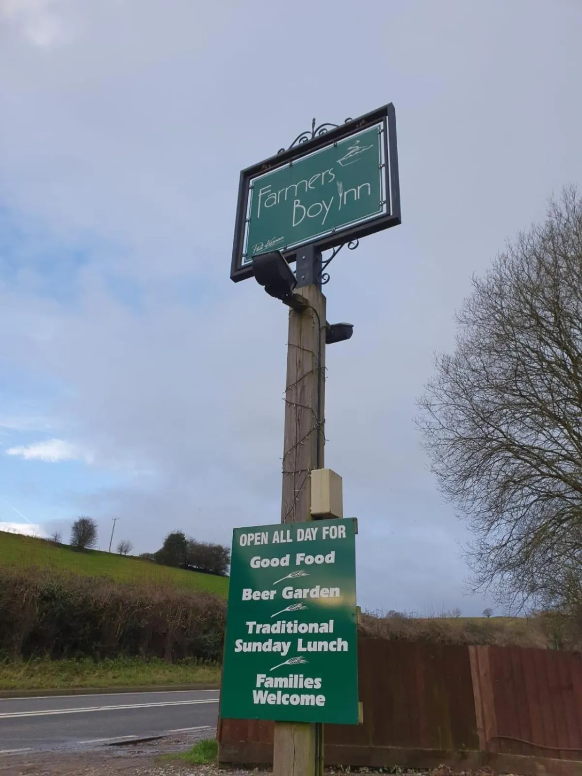 Property logo or sign in The Farmers Boy Inn Guest House