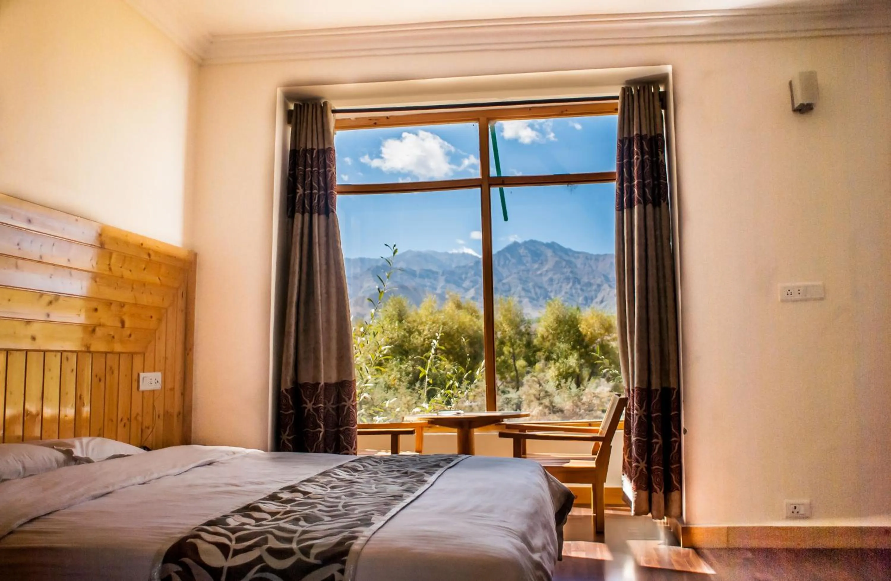 Photo of the whole room, Bed in The Nature Residency - A Riverside Resort in Leh