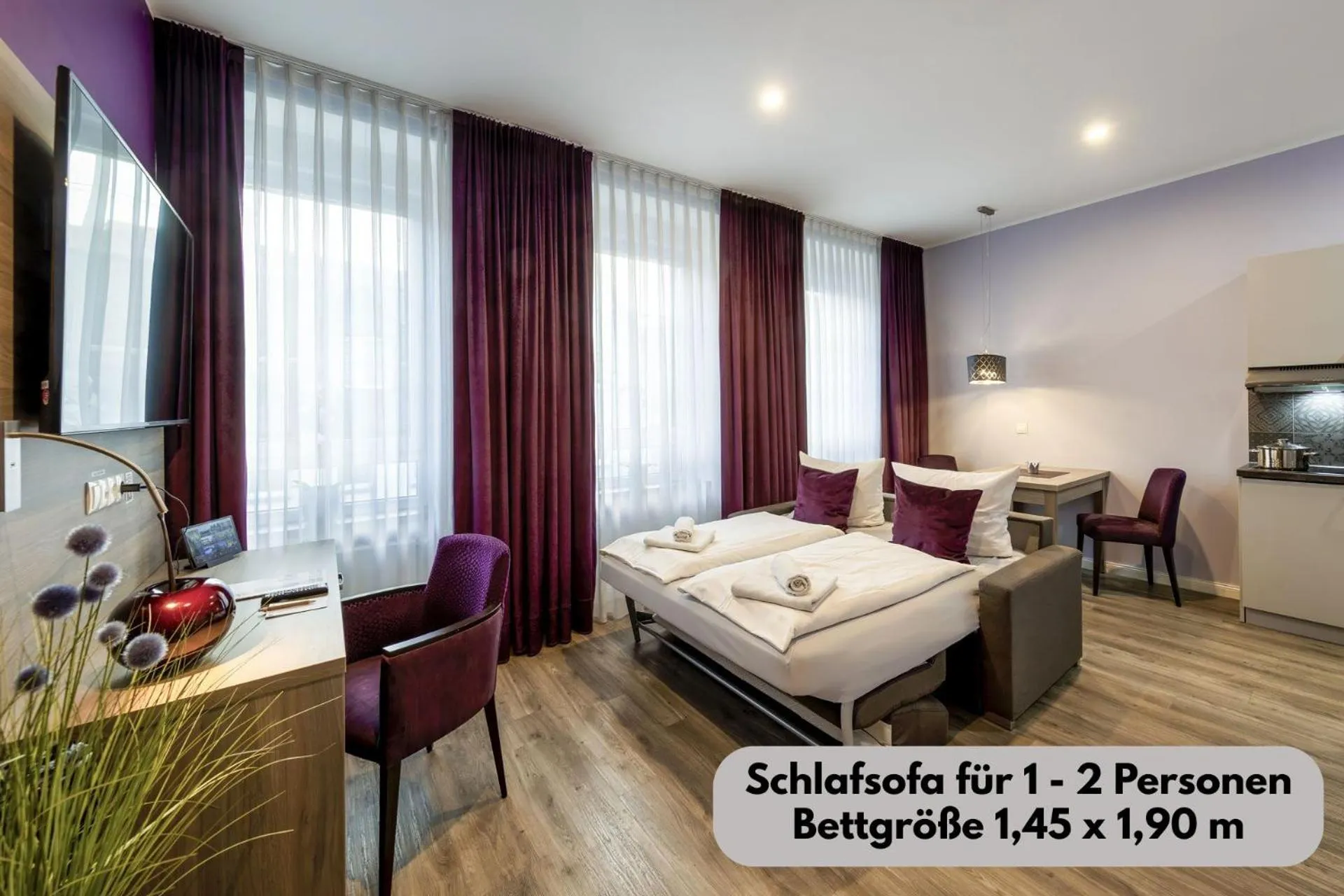 Bed in Apartmenthaus Burgenheimat in Rhens bei Koblenz