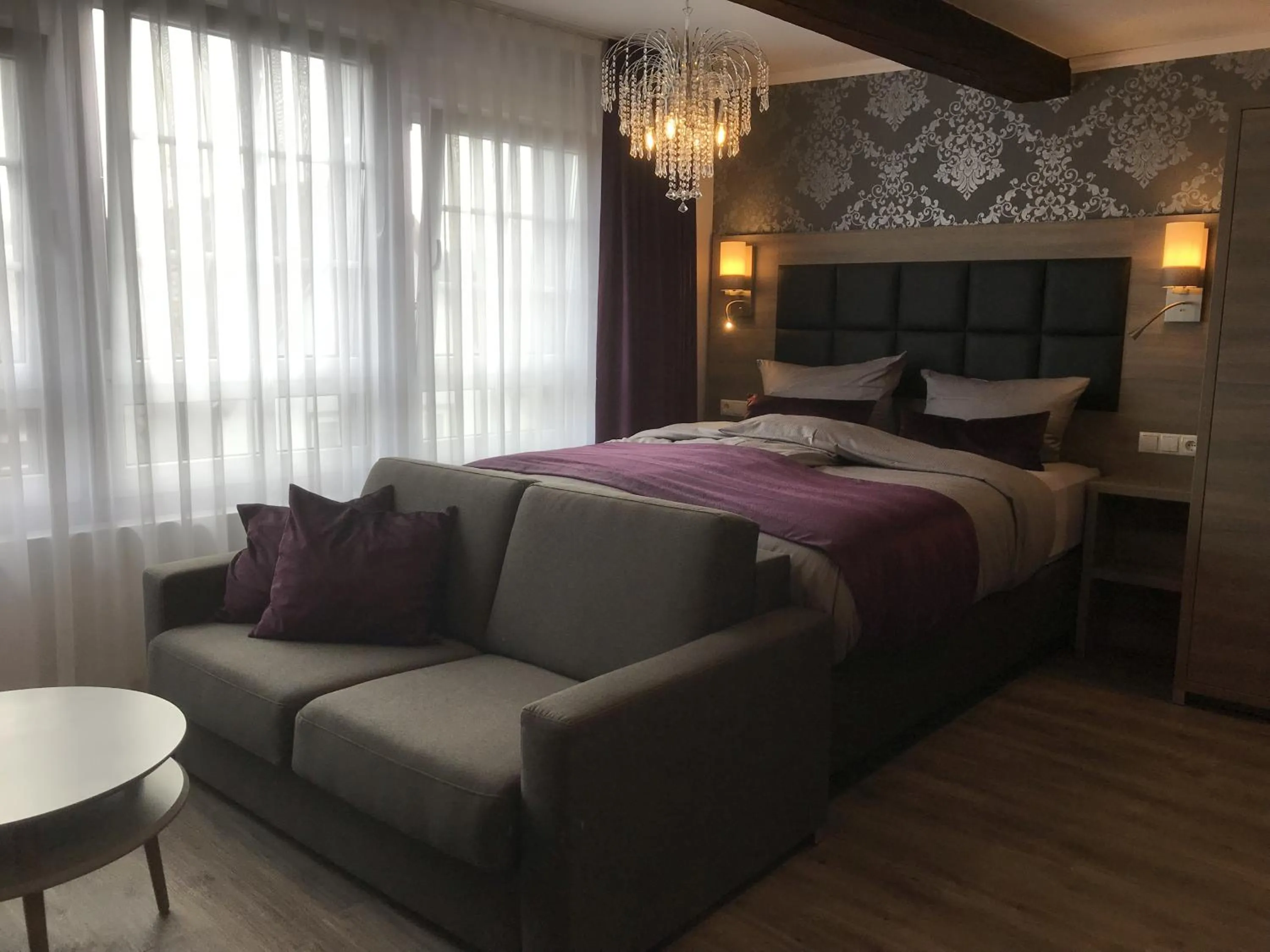 Bed in Apartmenthaus Burgenheimat in Rhens bei Koblenz