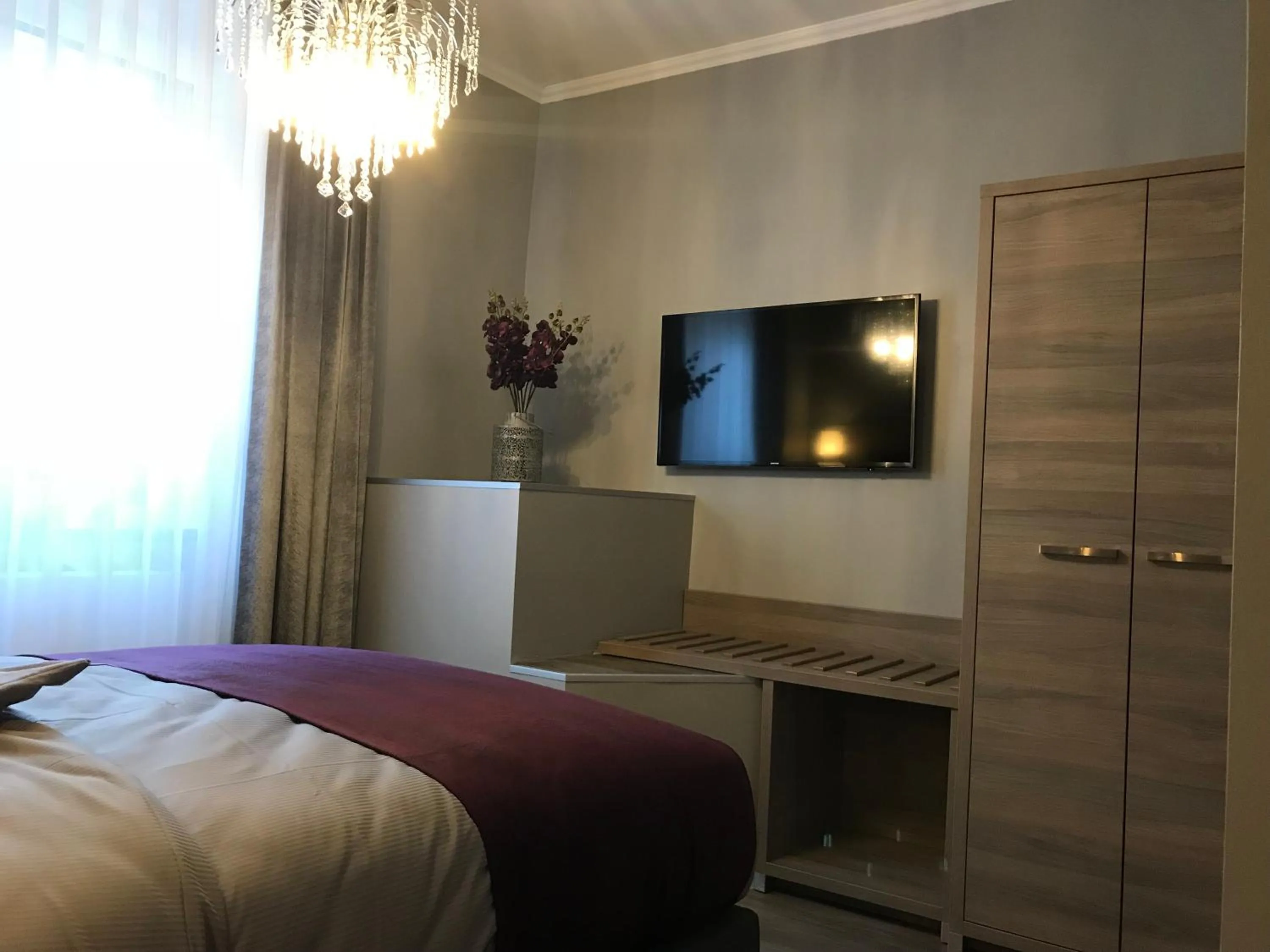 Bed in Apartmenthaus Burgenheimat in Rhens bei Koblenz