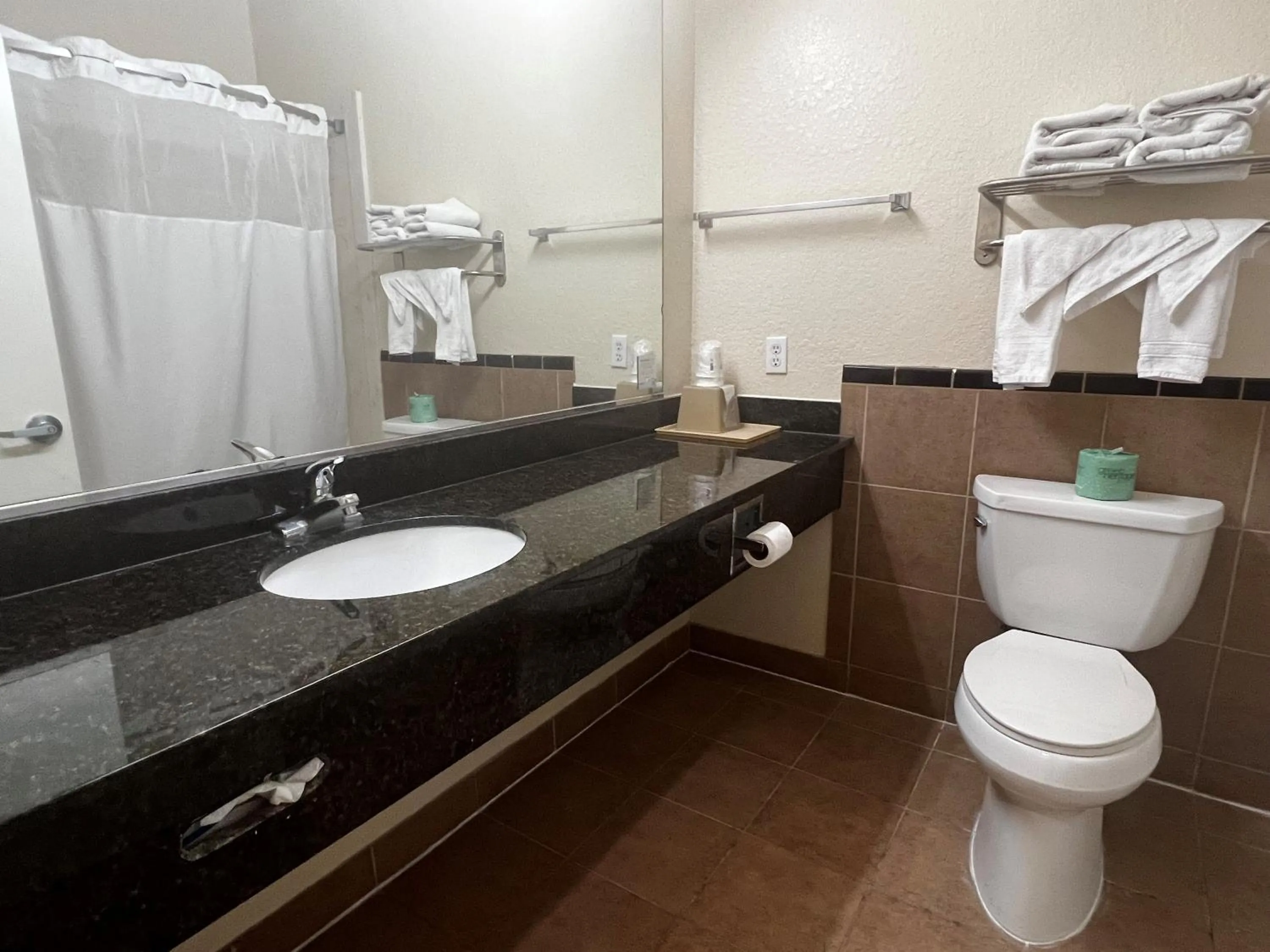 Bathroom in Super 8 by Wyndham Brookshire TX