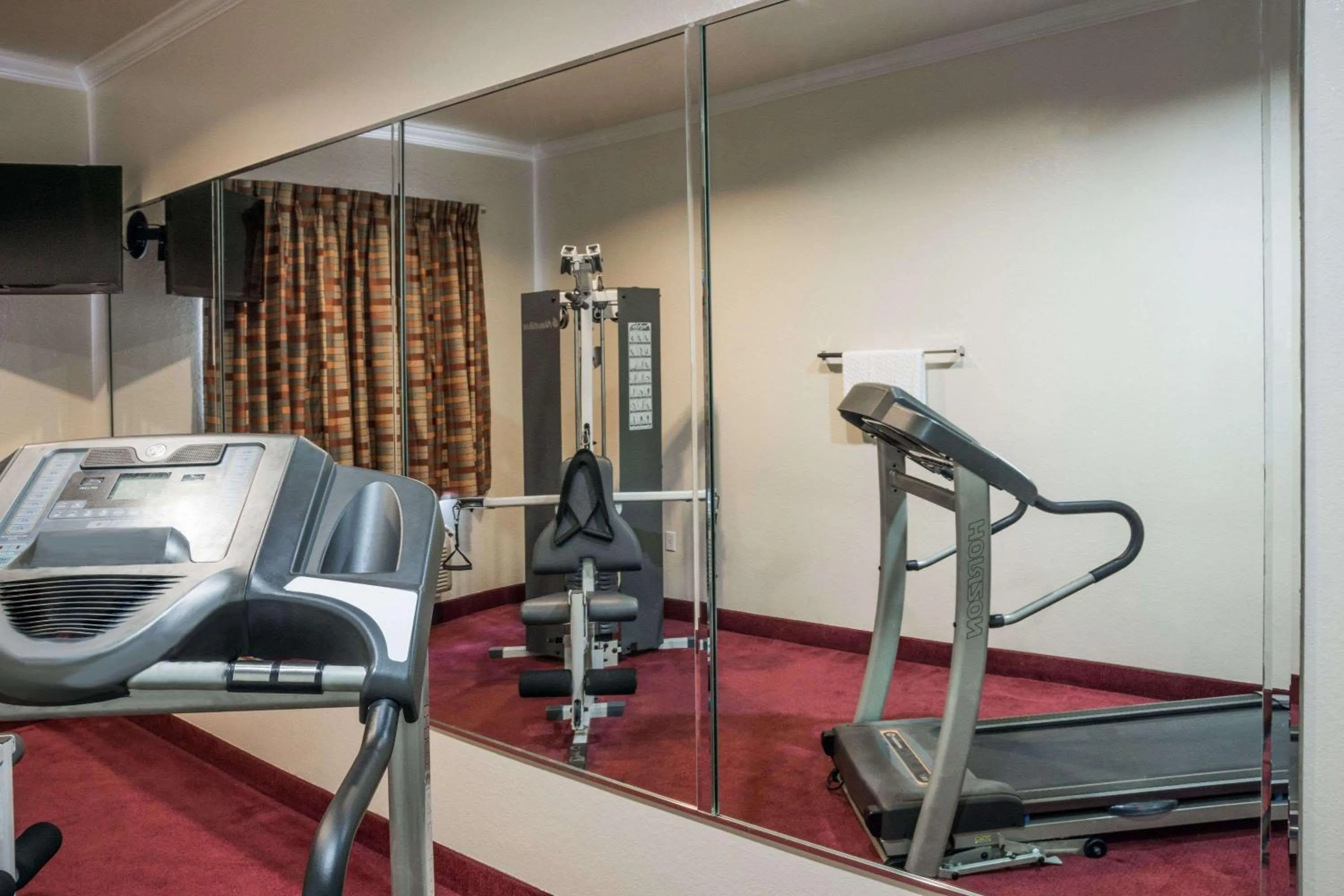 Fitness centre/facilities in Super 8 by Wyndham Brookshire TX