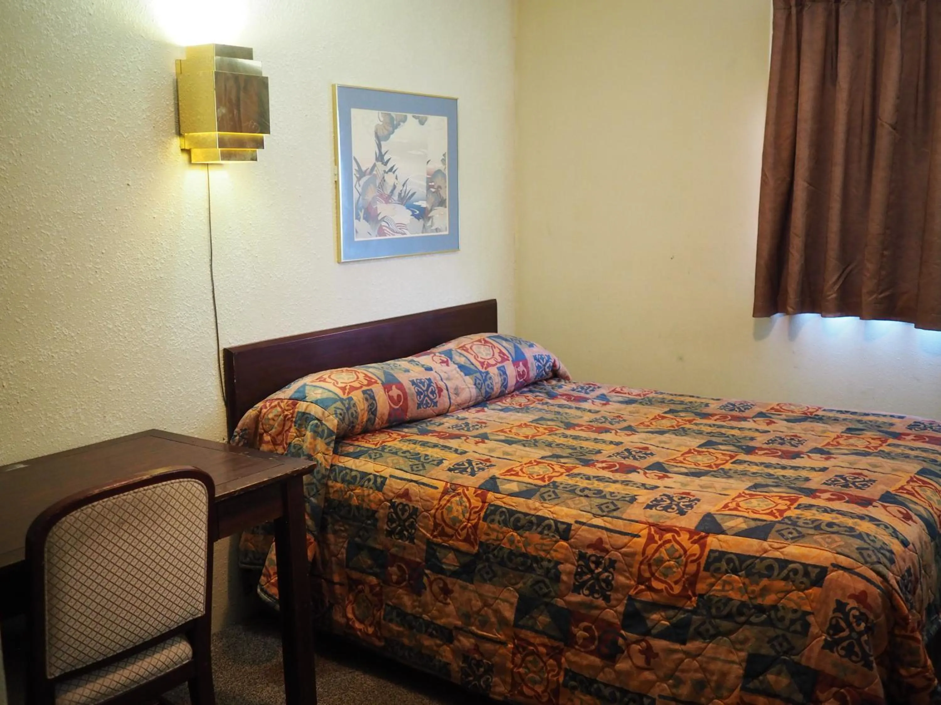 Bed in The Cavalier Inn