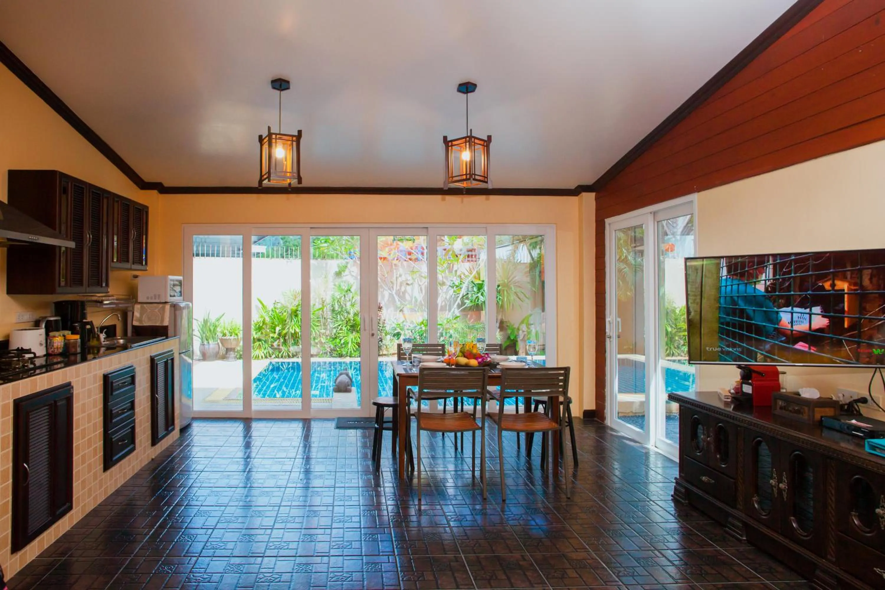 Dining area in Baan Manuchang Villa, SHA Certified