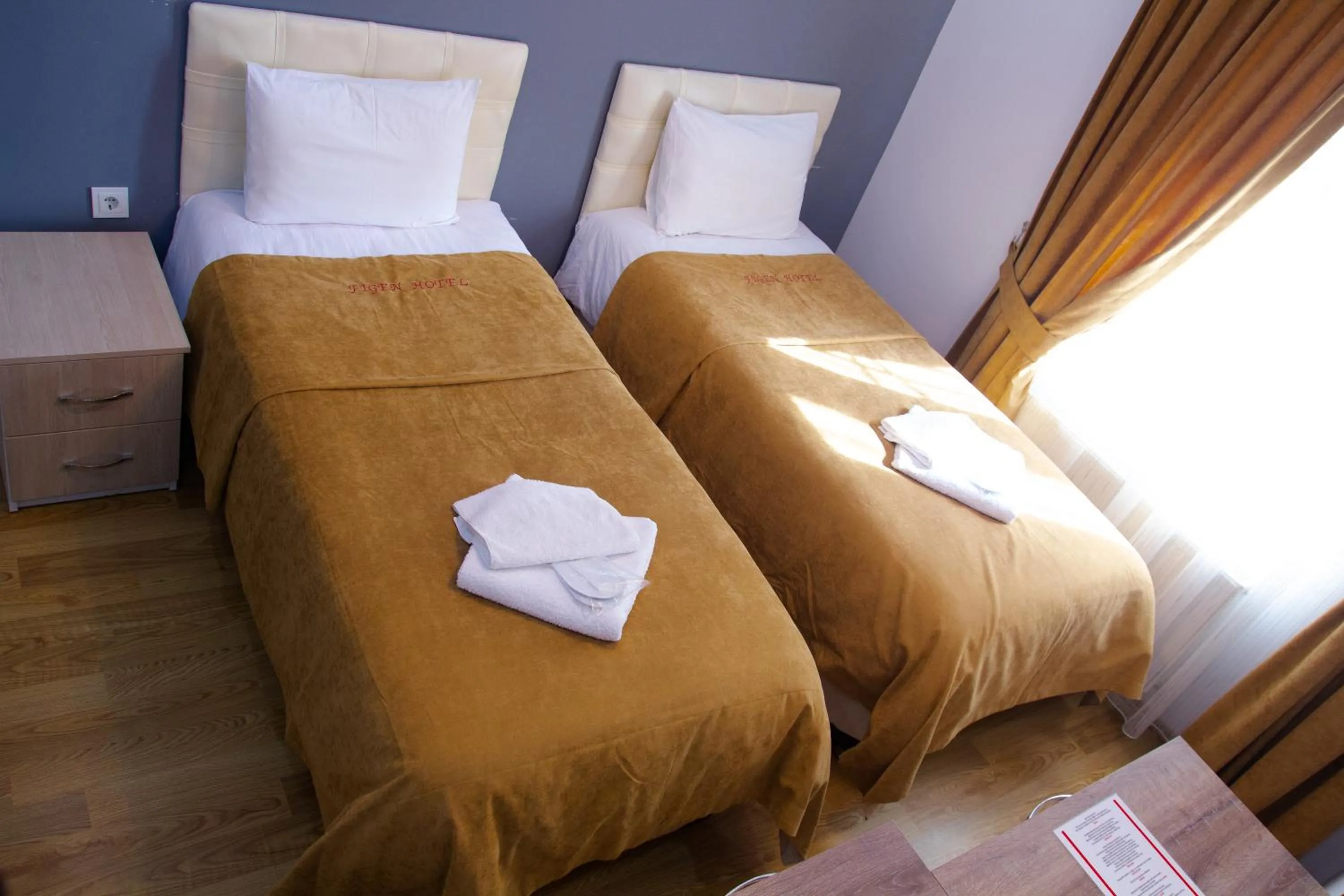 Bed in Figen Hotel