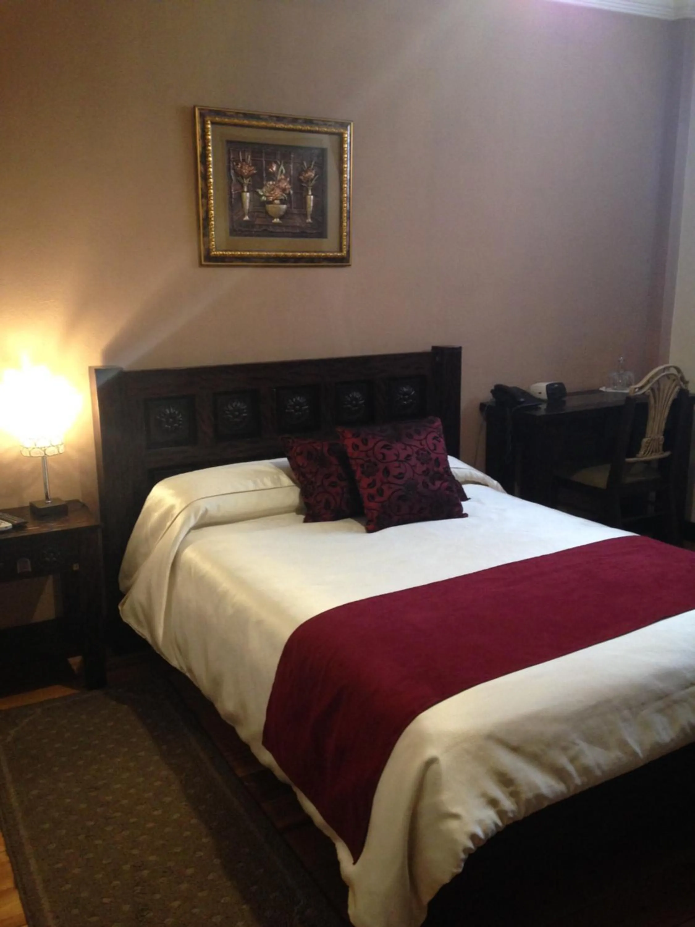 Photo of the whole room, Bed in La Posada Cuencana Hotel