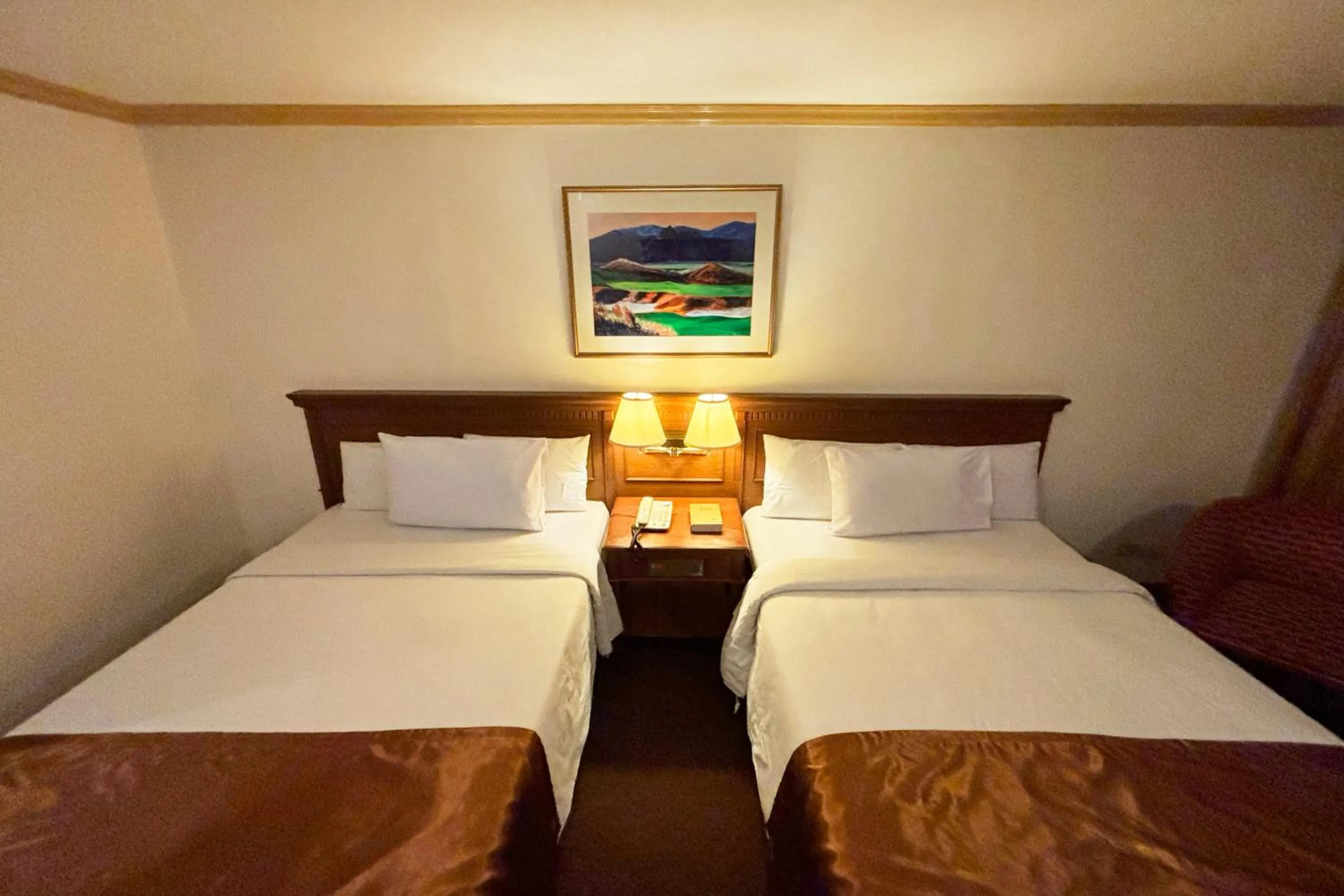 Bed in Tiara Oriental Hotel Makati powered by Cocotel