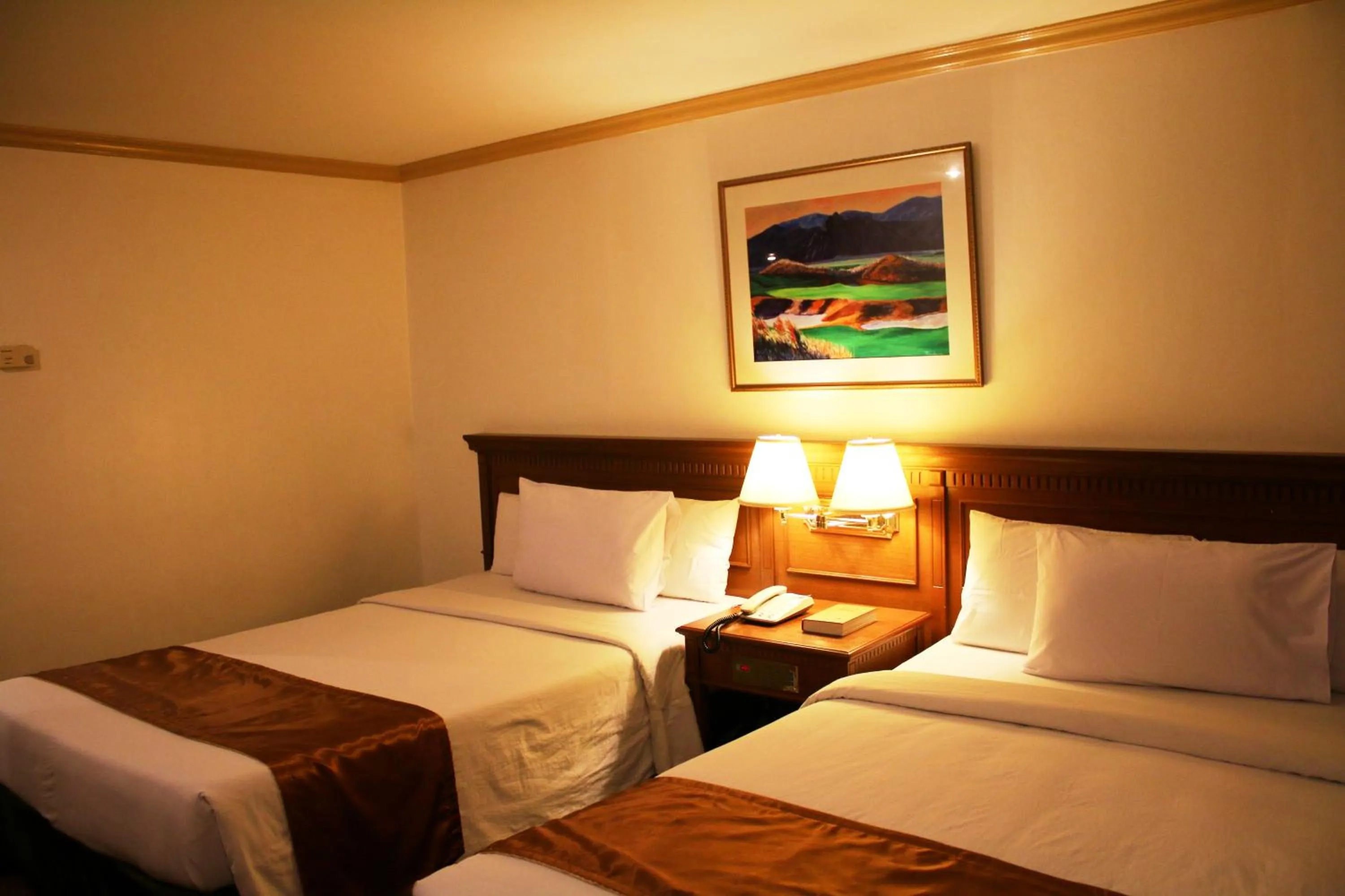 Bed in Tiara Oriental Hotel Makati powered by Cocotel