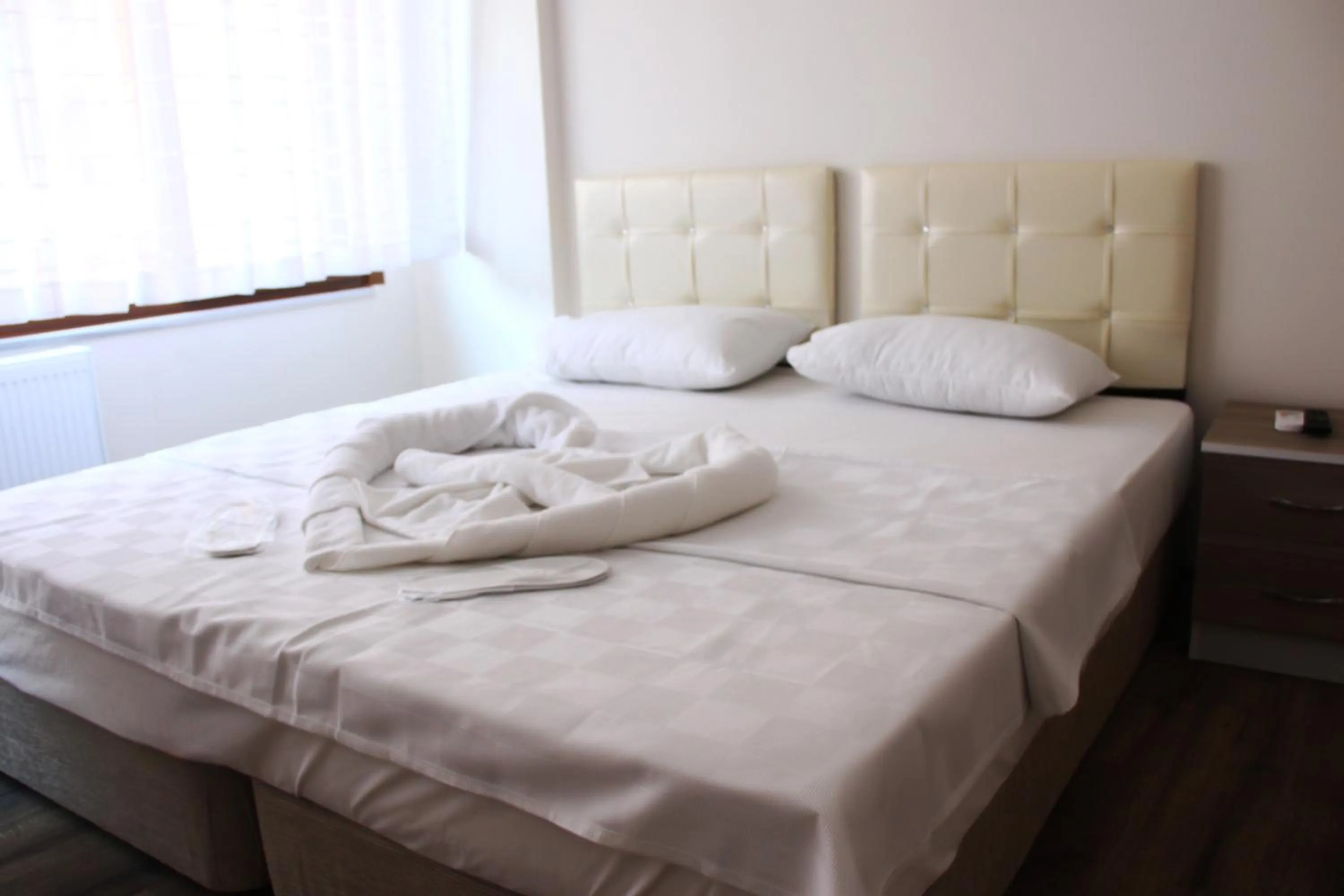 Bed in Marpalace Hotel