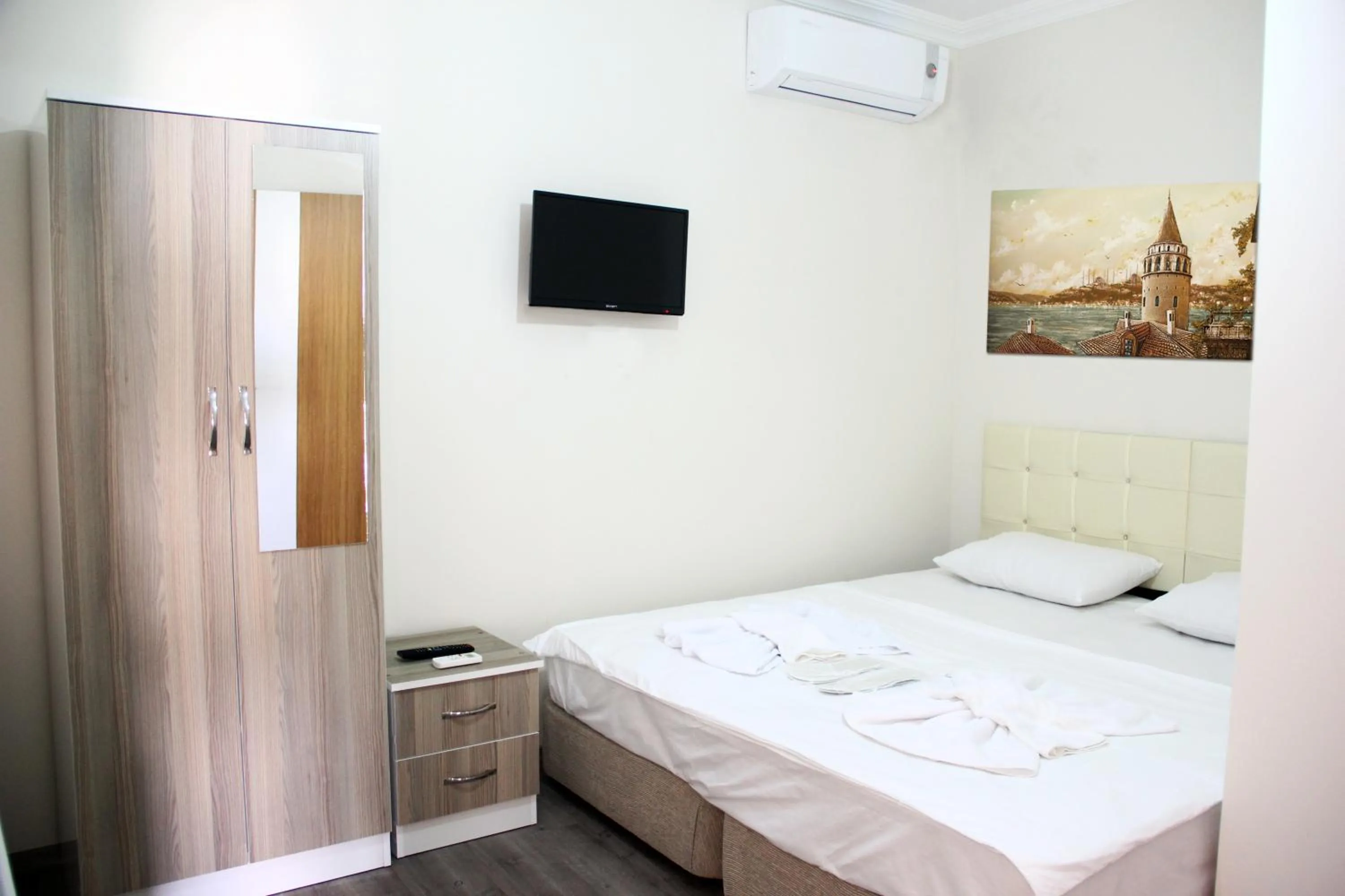 Bed in Marpalace Hotel