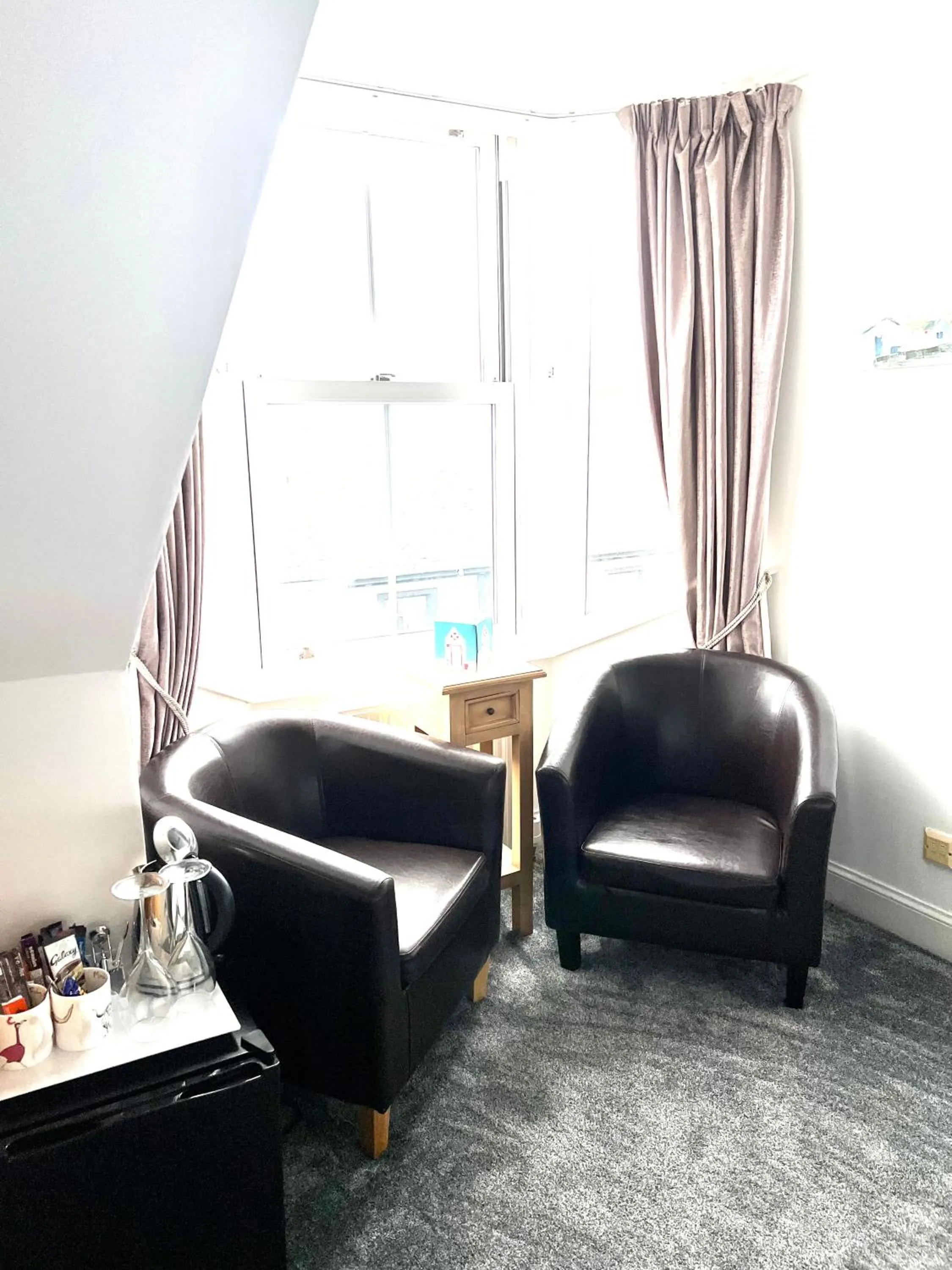 Seating area in ByTheSea Guest House License SA-00247-F