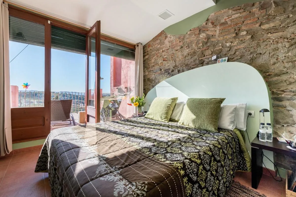 Bed in Hotel Cal Llop